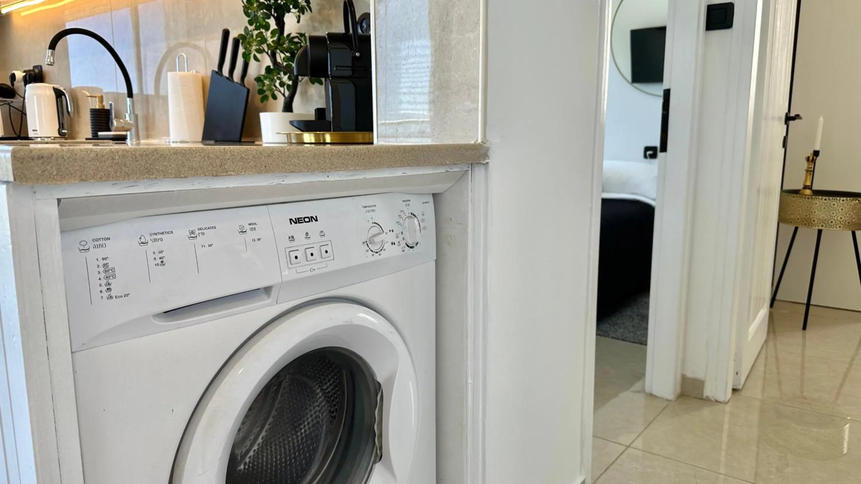 washing machine in GW951 Gugel Waves Amazing Seaview Apartments