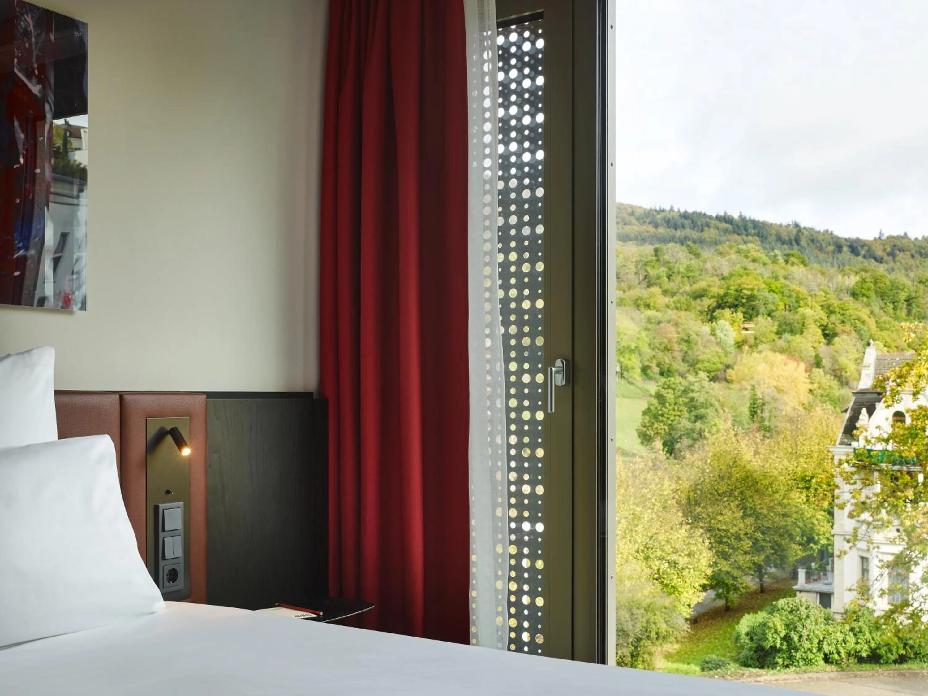 Photo of the whole room, Bed in TRIBE Baden-Baden