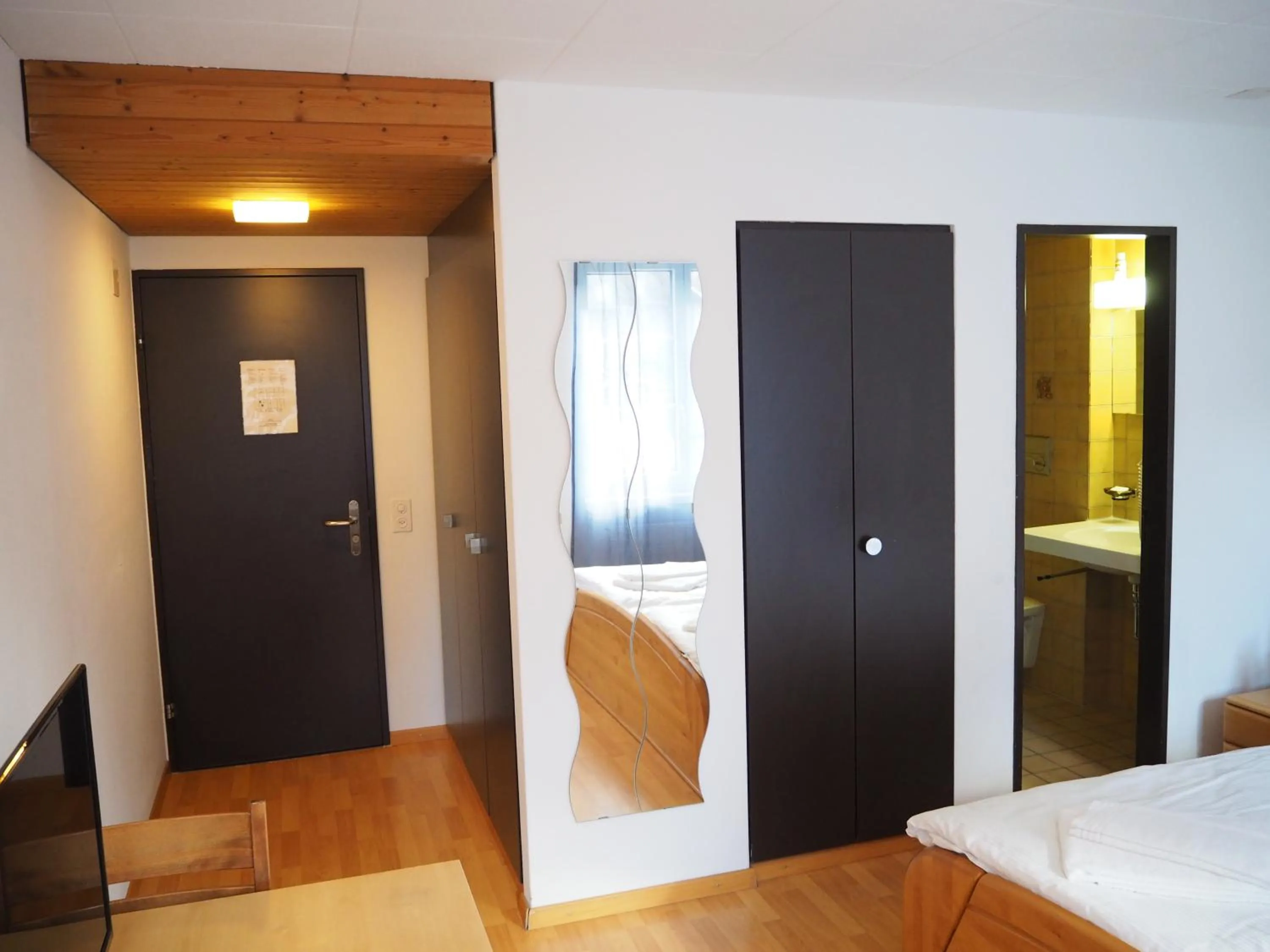 Bed in Hotel Stadthof Glarus