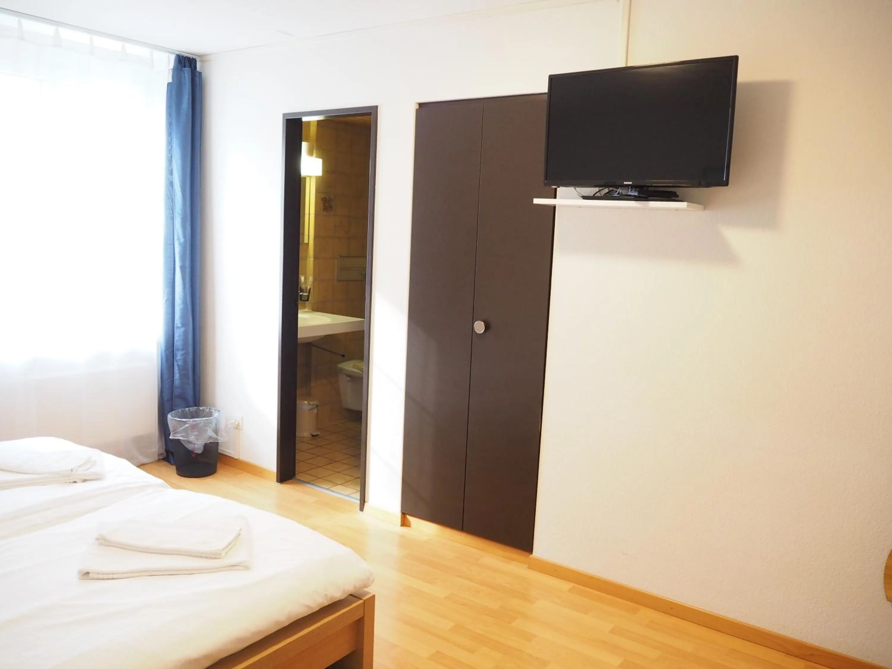 Bed in Hotel Stadthof Glarus