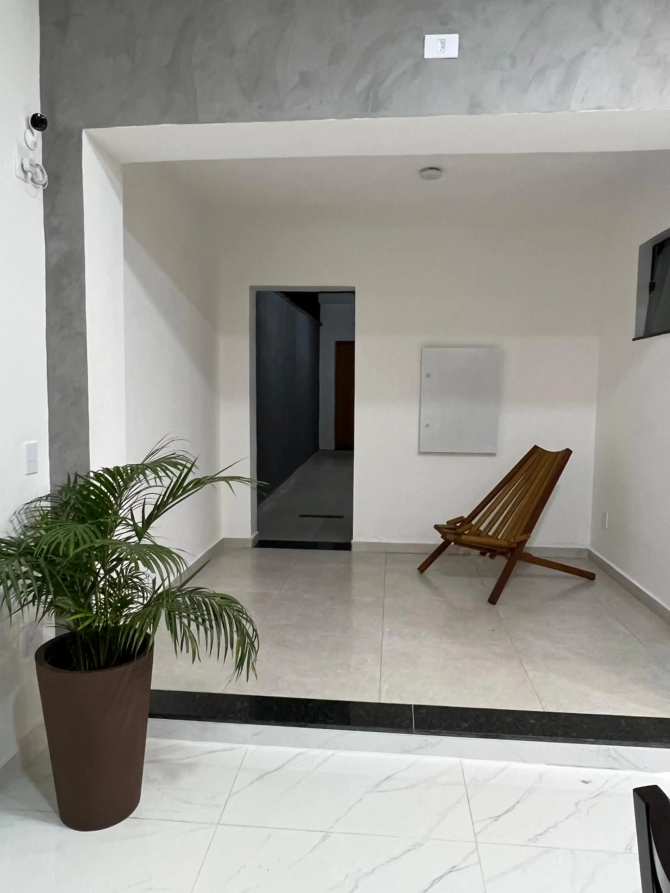 Seating area in Hotel Pousada Colliseu