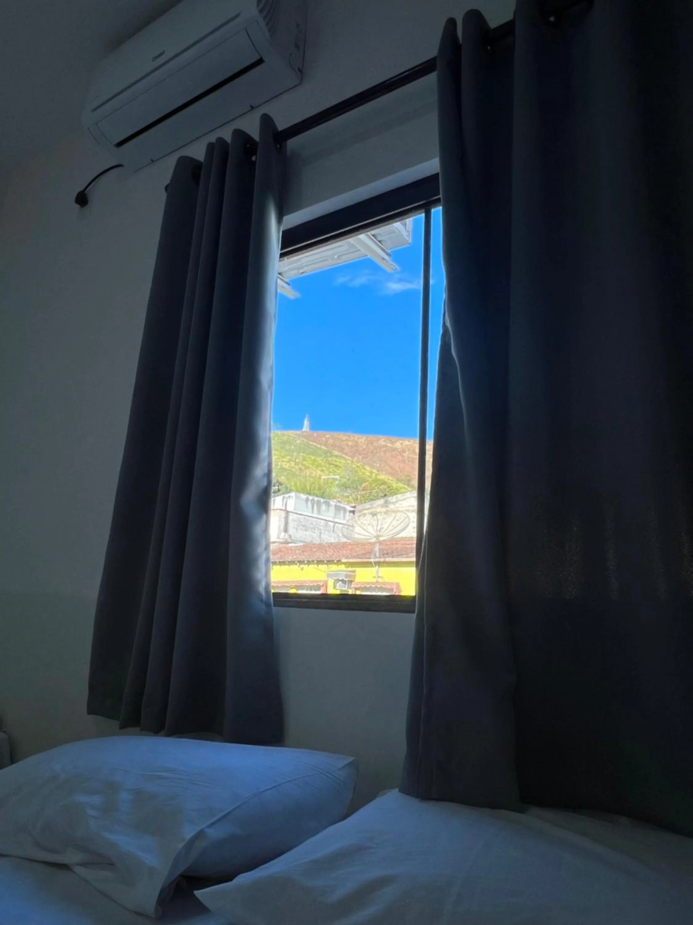 Bed in Hotel Pousada Colliseu