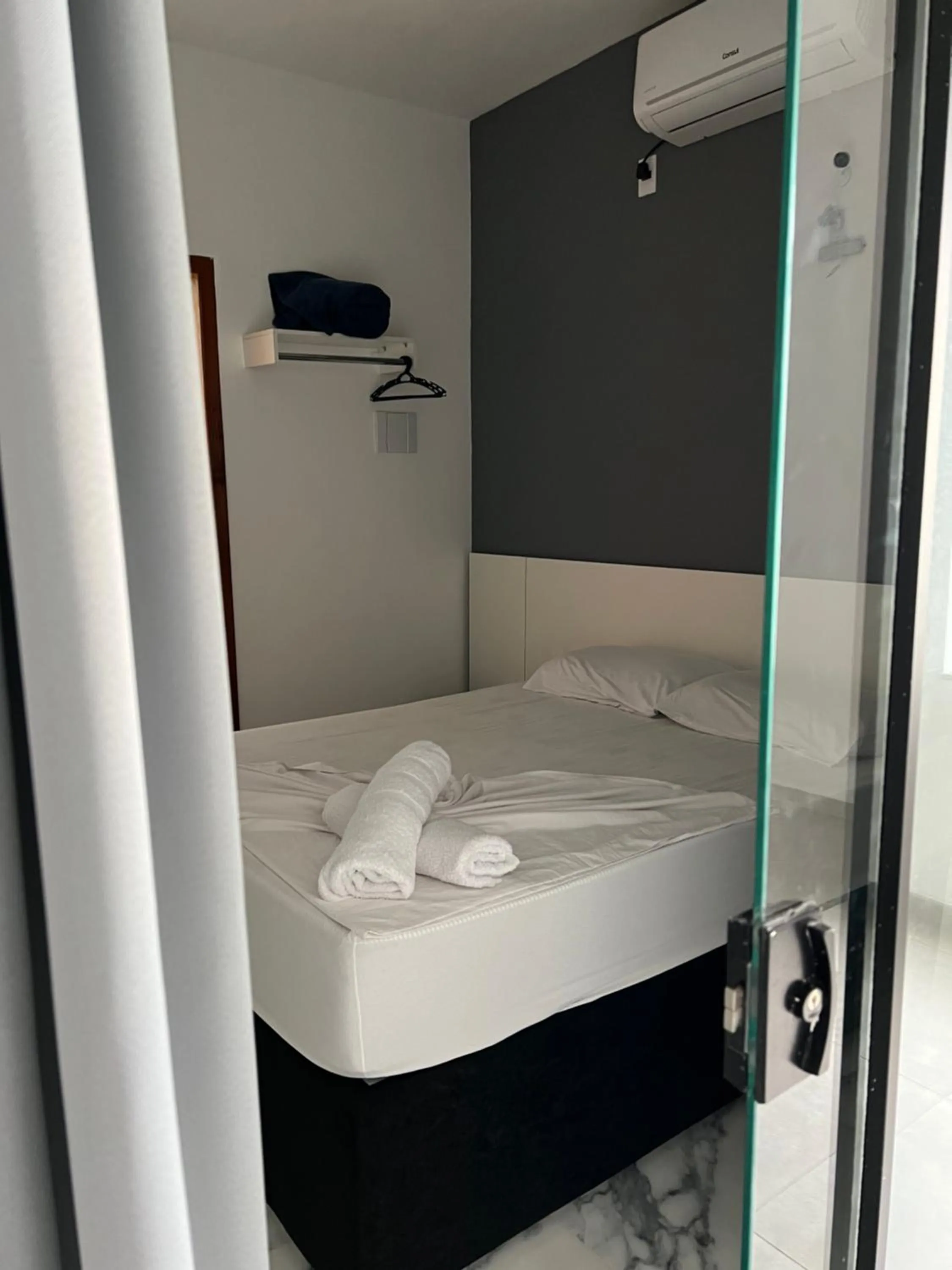 Bed in Hotel Pousada Colliseu