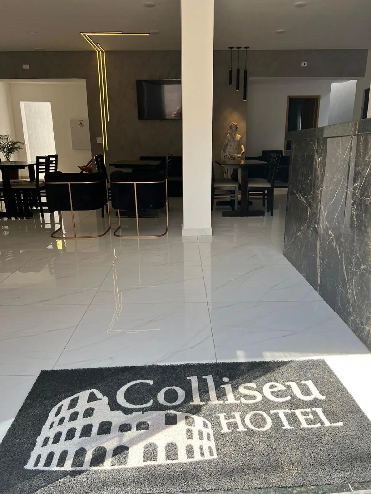 Lobby or reception in Hotel Pousada Colliseu