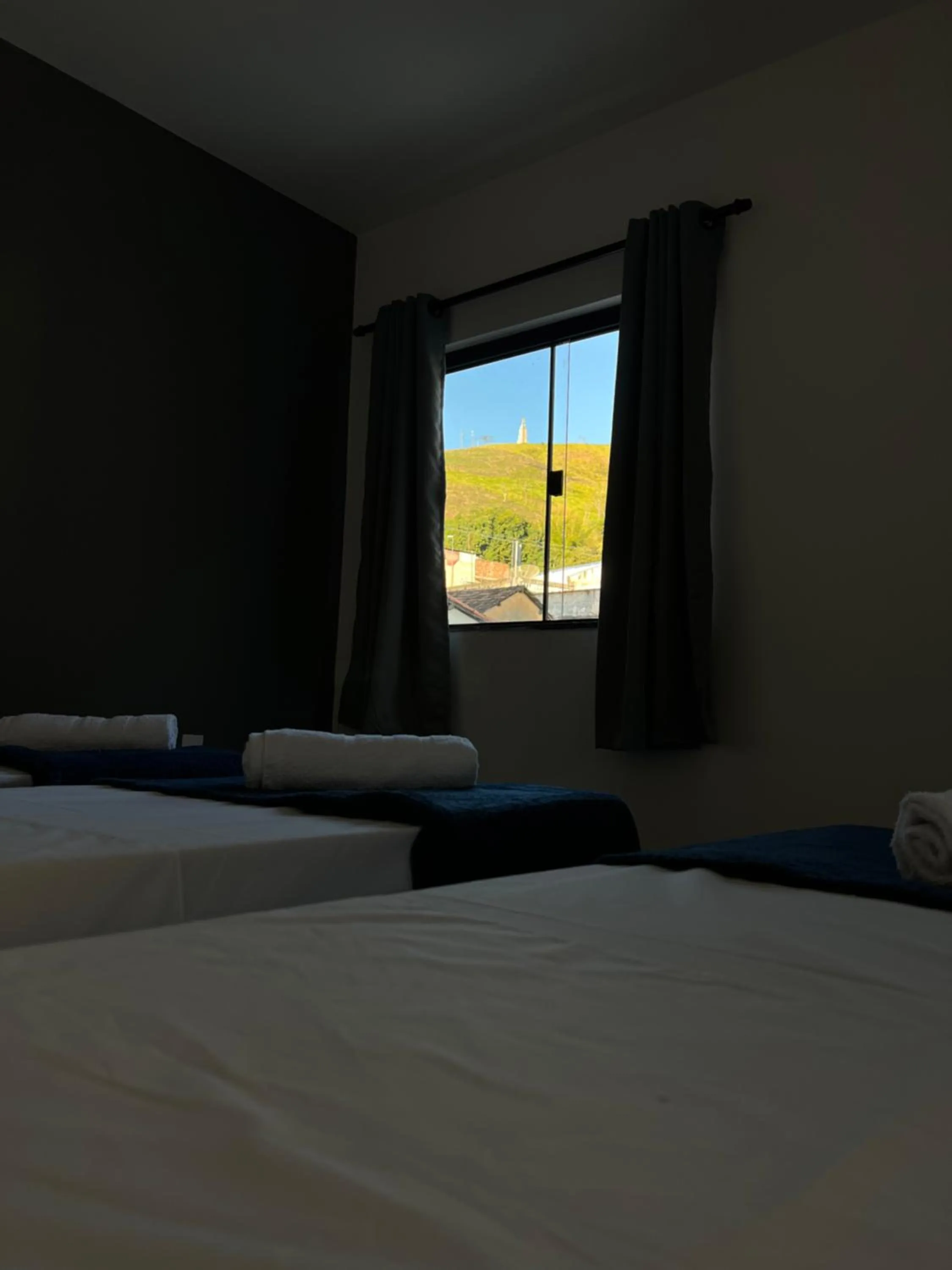 Bed in Hotel Pousada Colliseu