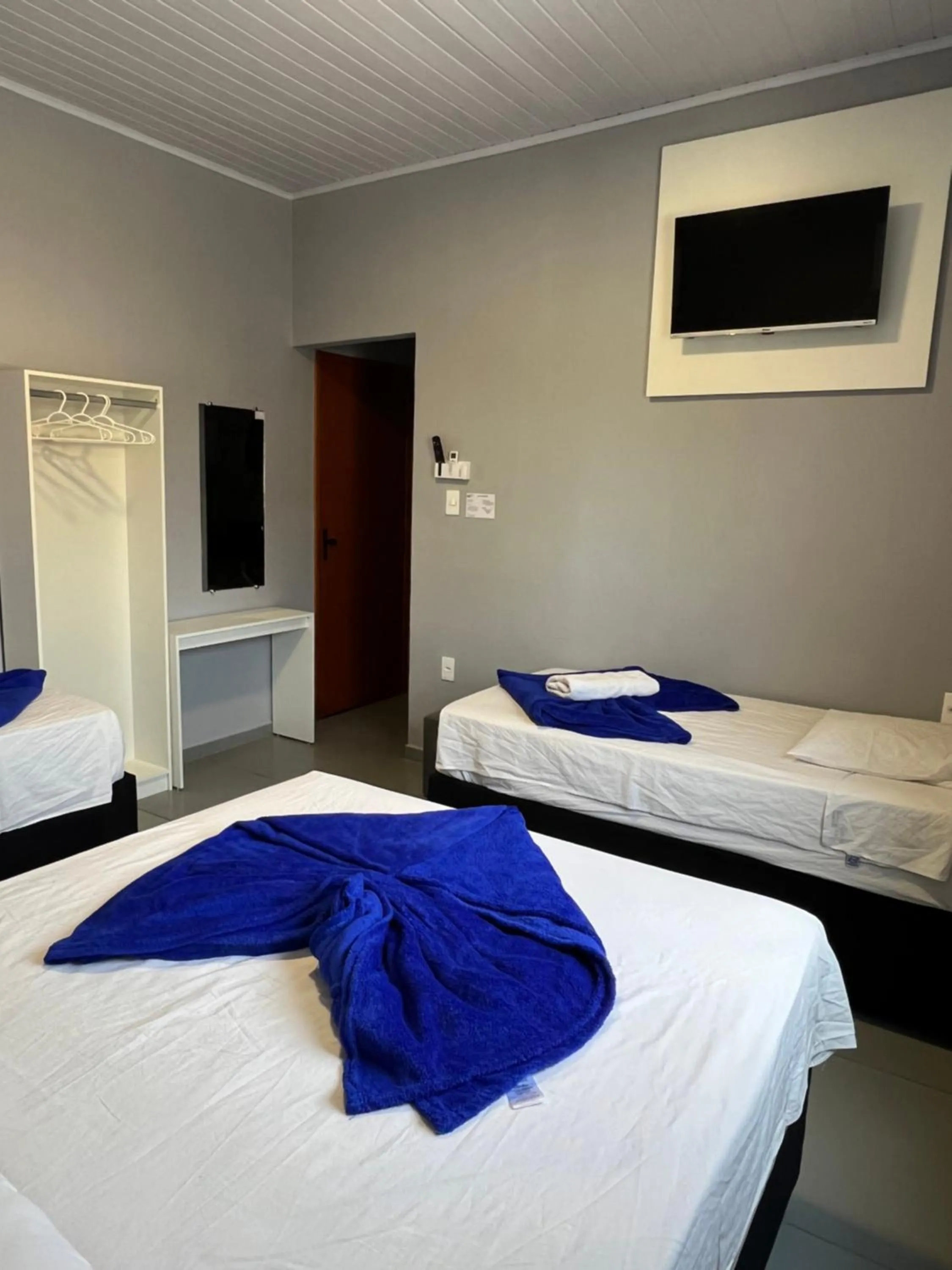 Bed in Hotel Pousada Colliseu