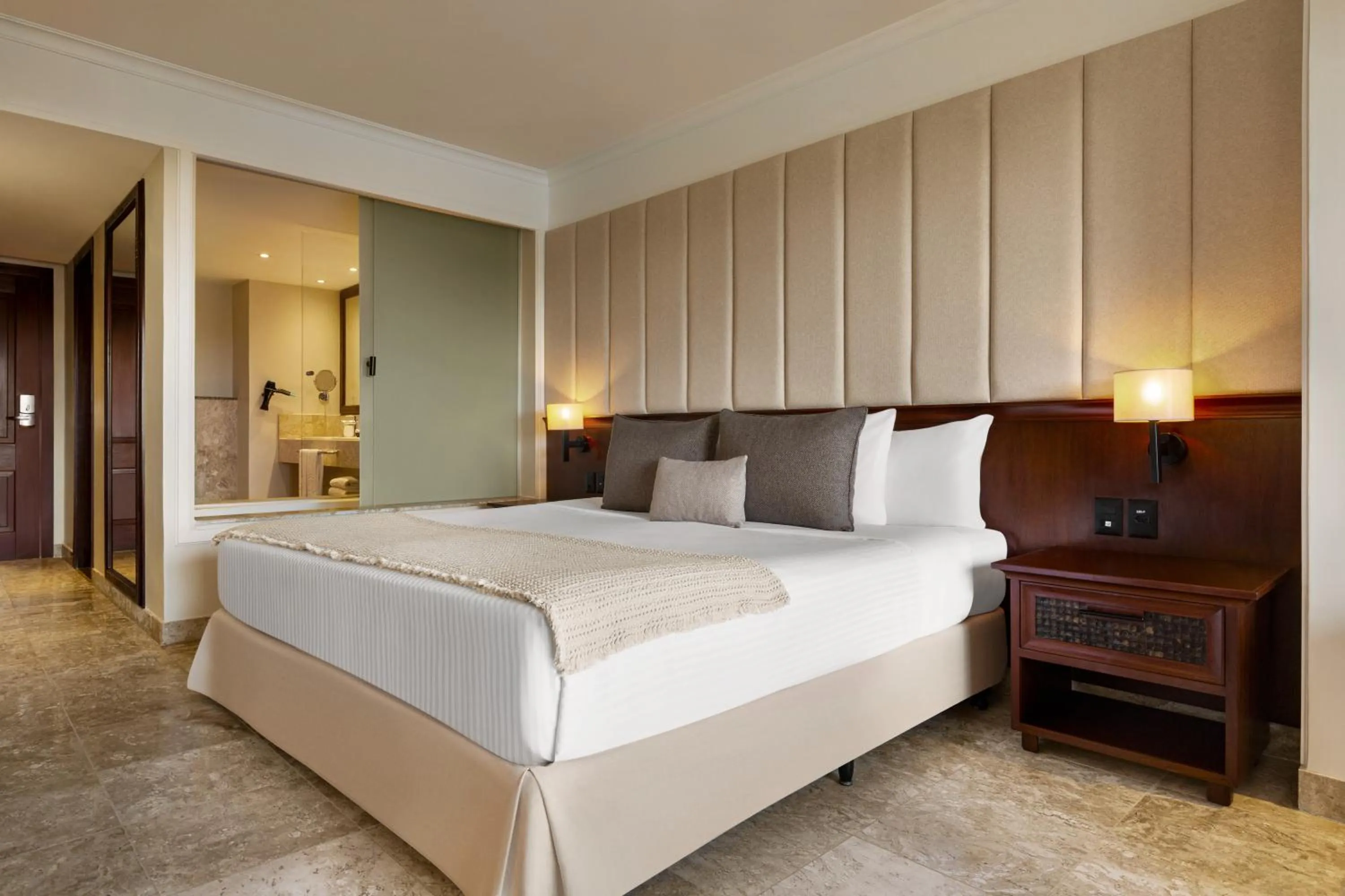 Bed in The Signature Level at Grand Palladium Imbassaí Resort & Spa