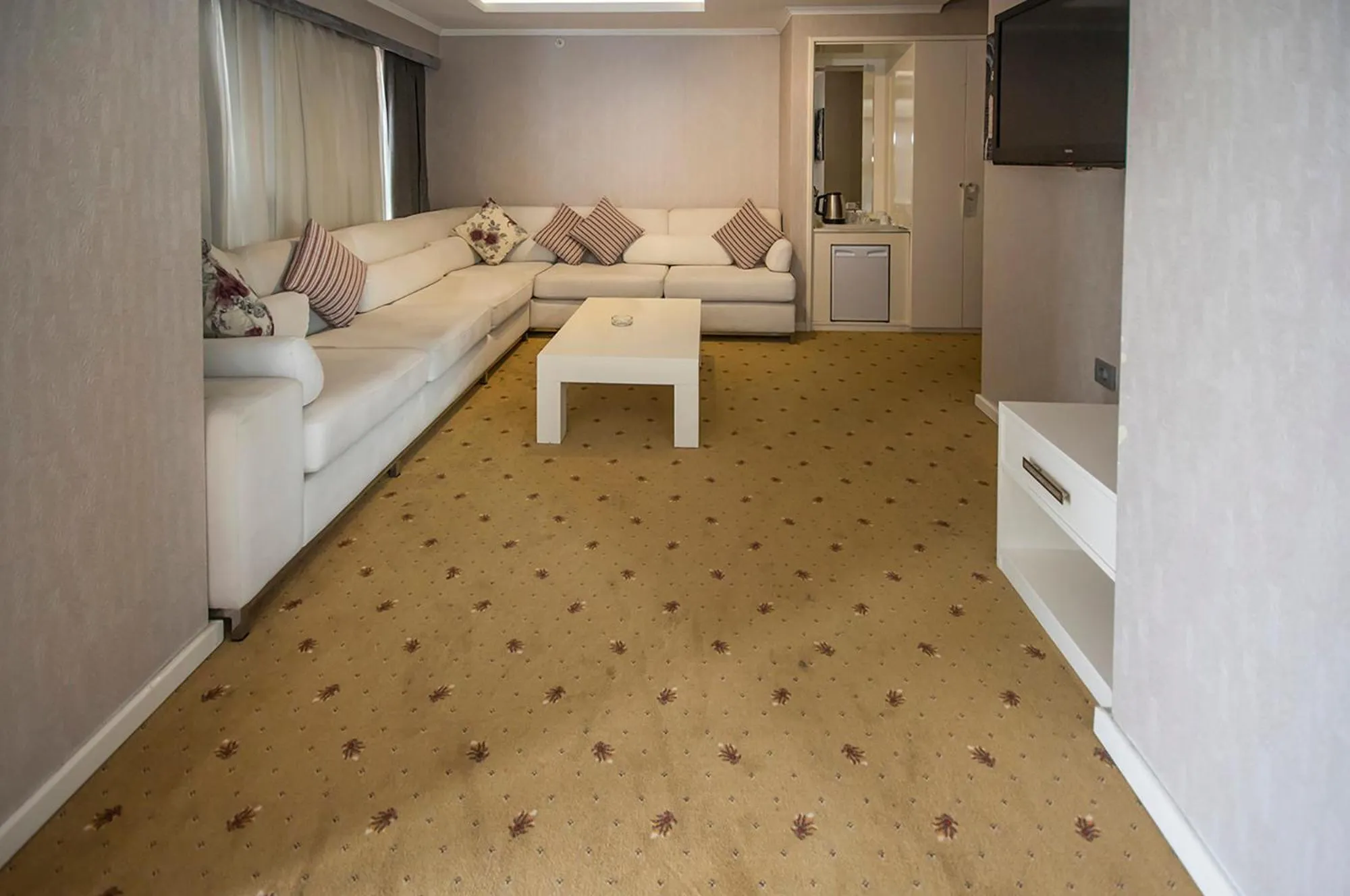 Living room, Bed in NK Hotel