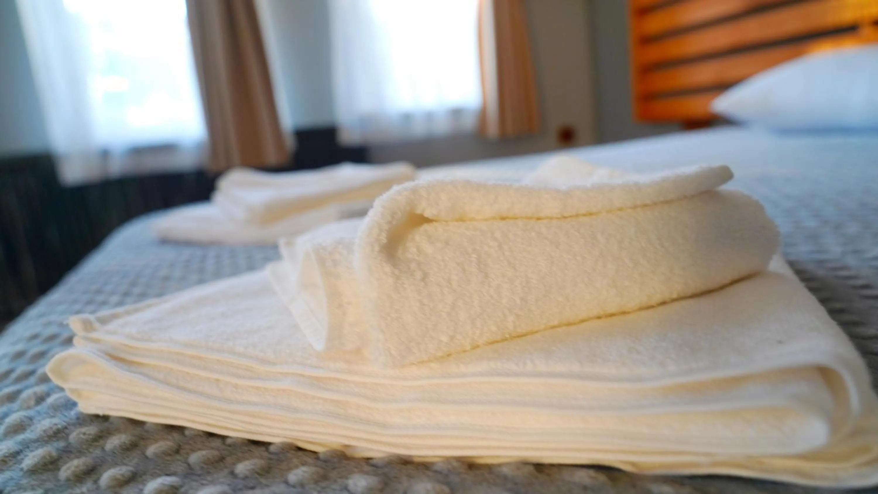 towels, Bed in Alpha Stone House