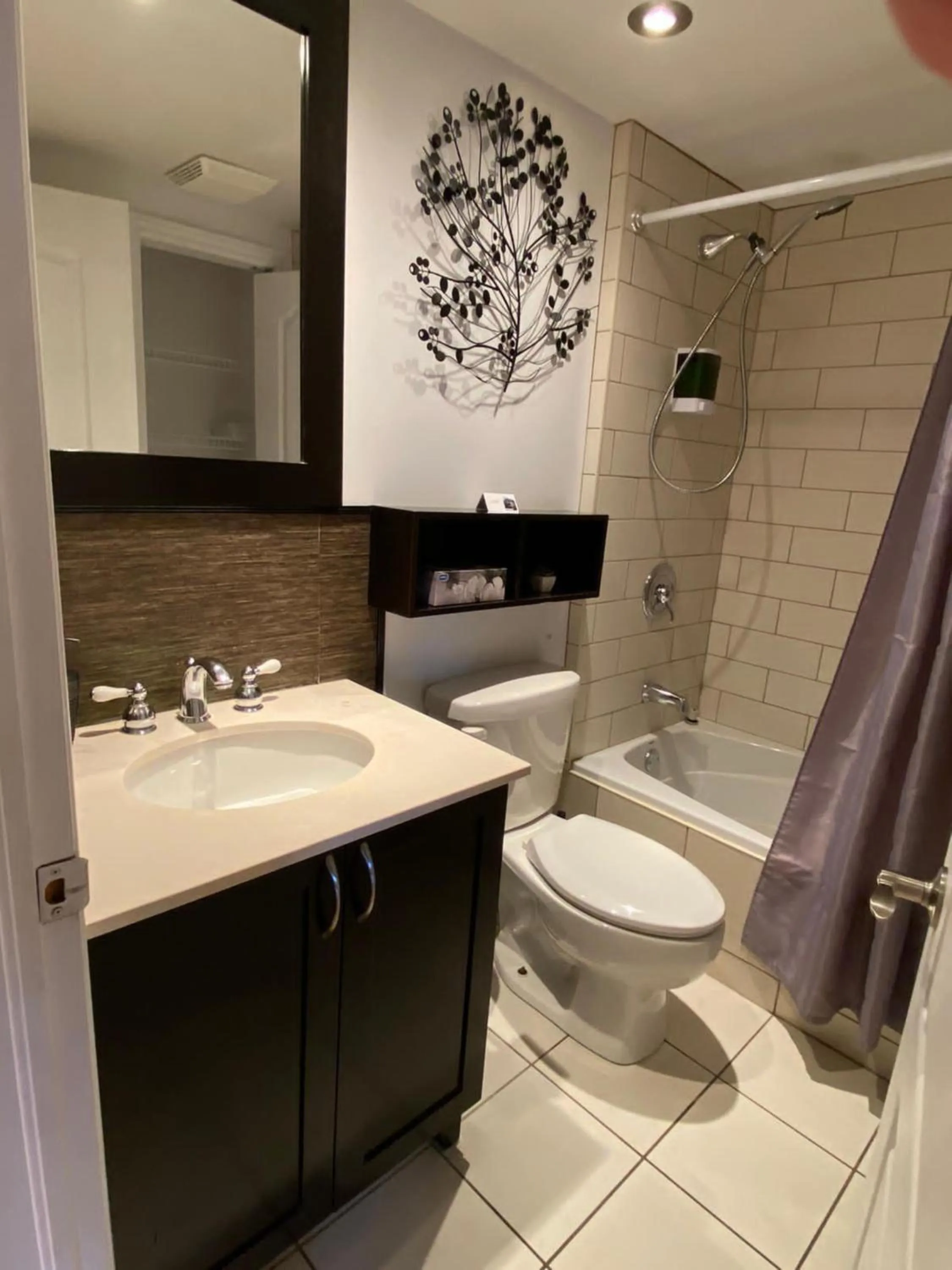Bathroom in ApartHotelMontreal by Les Terrasses Saint Urbain 2225I2