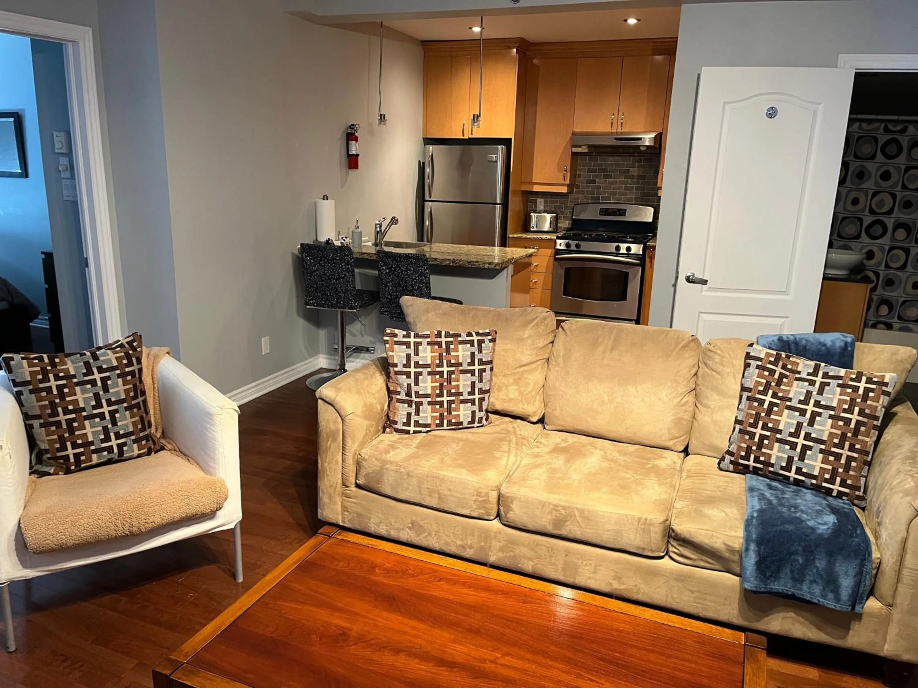 Living room in ApartHotelMontreal by Les Terrasses Saint Urbain 2225I2