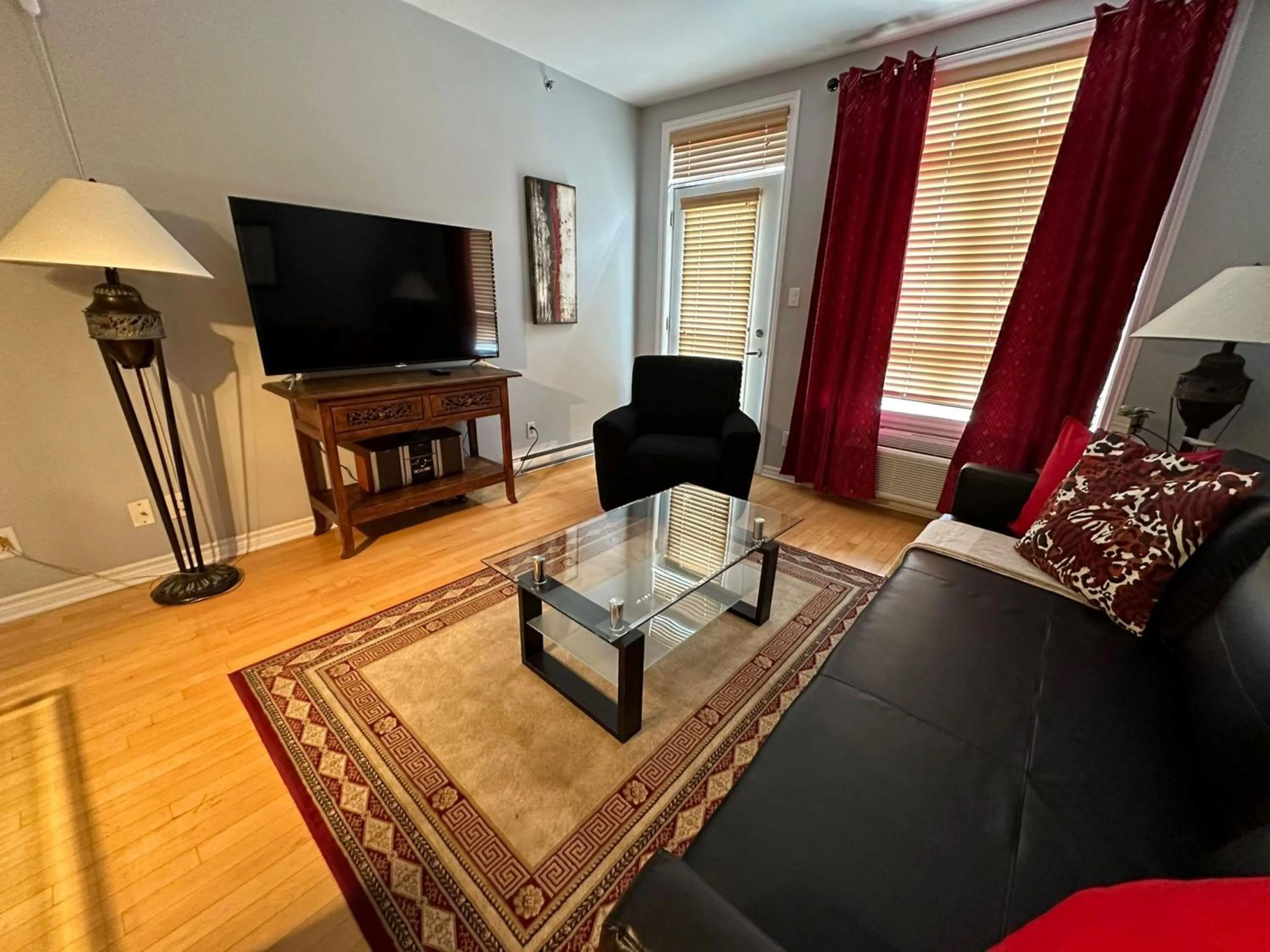 TV and multimedia in ApartHotelMontreal by Les Terrasses Saint Urbain 2225I2