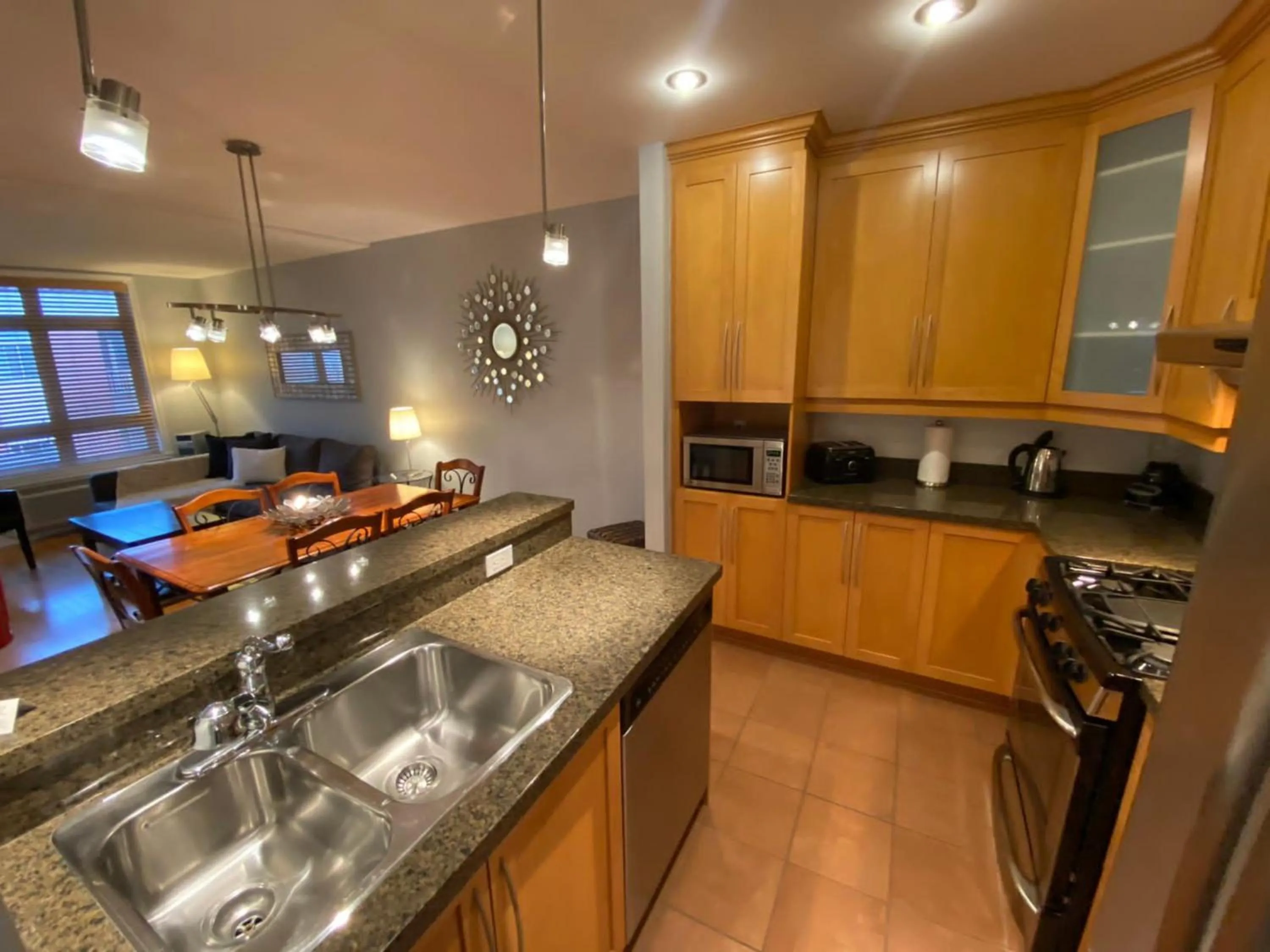 kitchen in ApartHotelMontreal by Les Terrasses Saint Urbain 2225I2