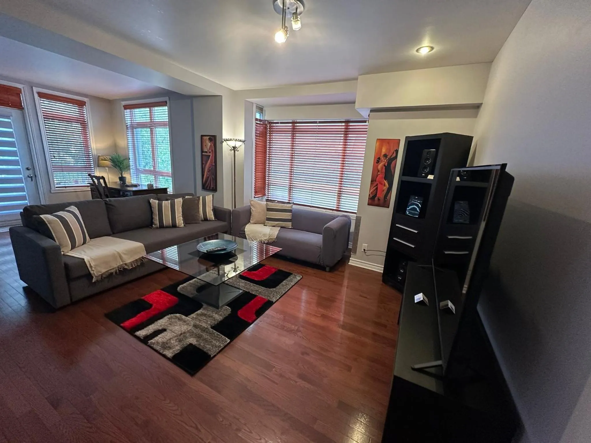 Living room in ApartHotelMontreal by Les Terrasses Saint Urbain 2225I2