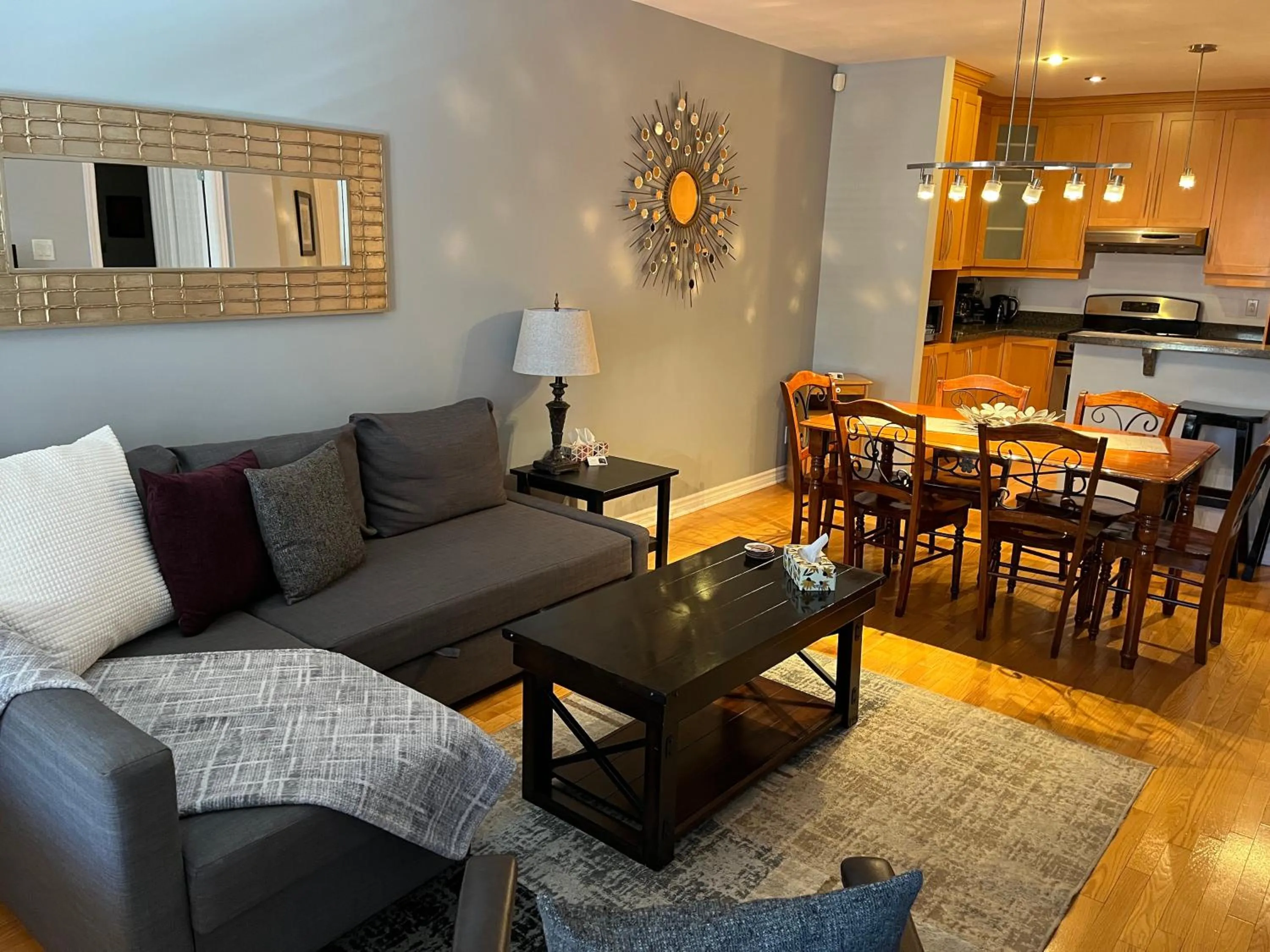 Living room in ApartHotelMontreal by Les Terrasses Saint Urbain 2225I2