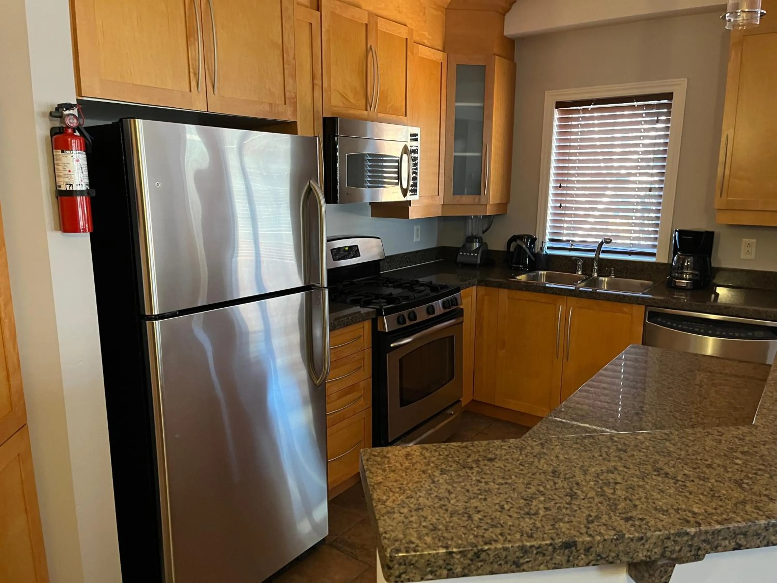 kitchen in ApartHotelMontreal by Les Terrasses Saint Urbain 2225I2