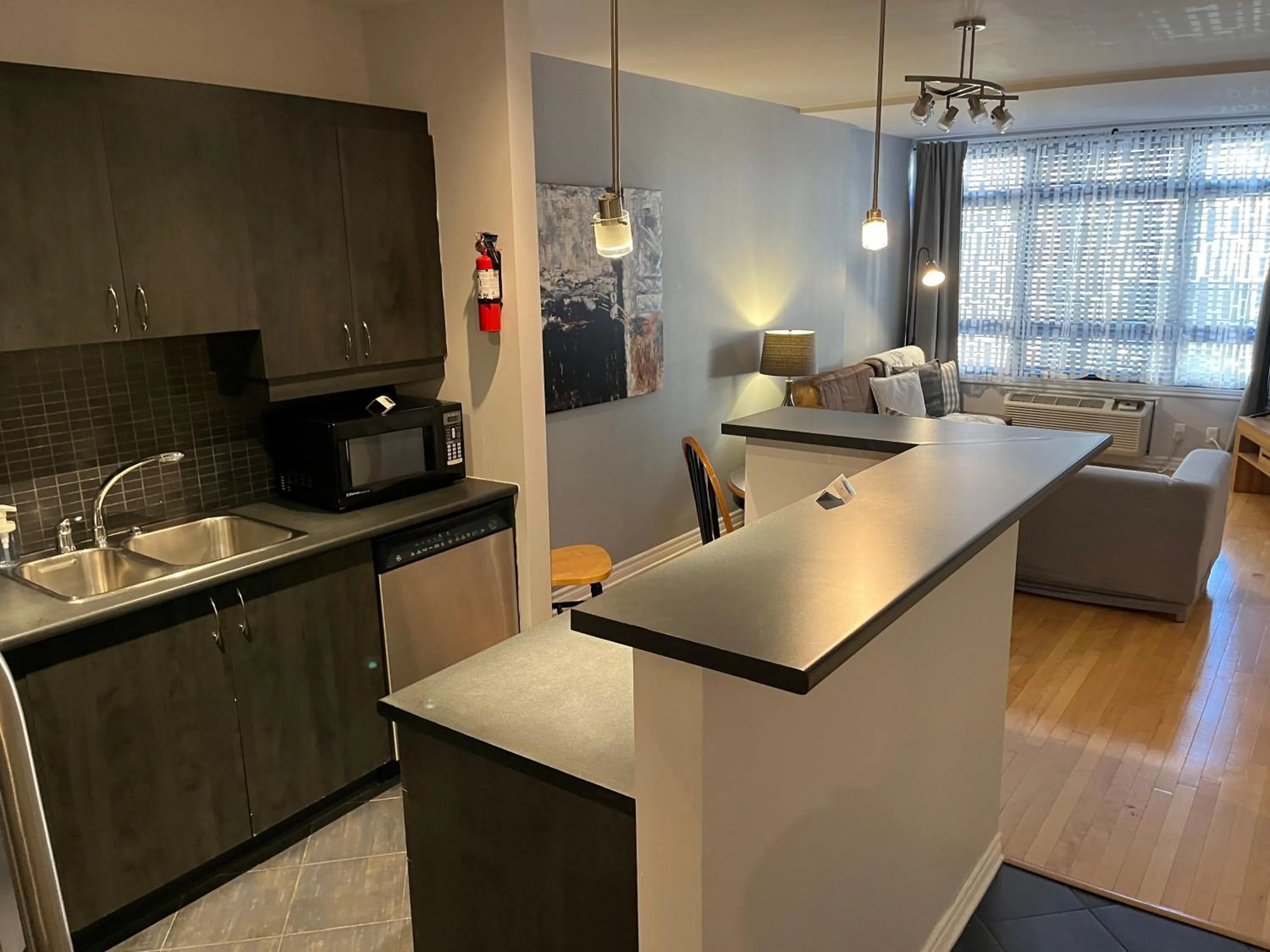 kitchen in ApartHotelMontreal by Les Terrasses Saint Urbain 2225I2