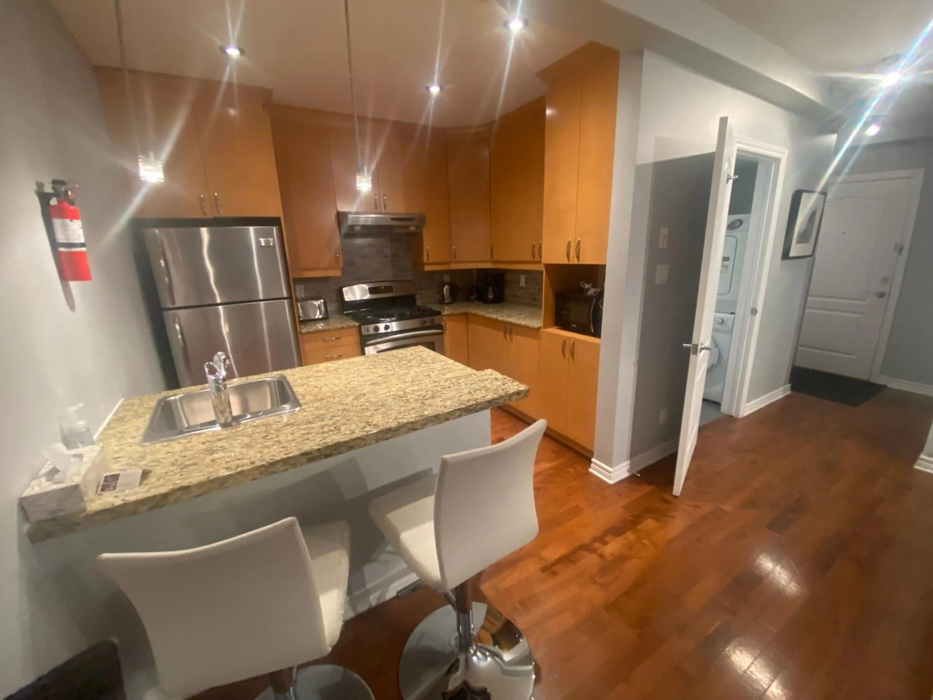 kitchen in ApartHotelMontreal by Les Terrasses Saint Urbain 2225I2