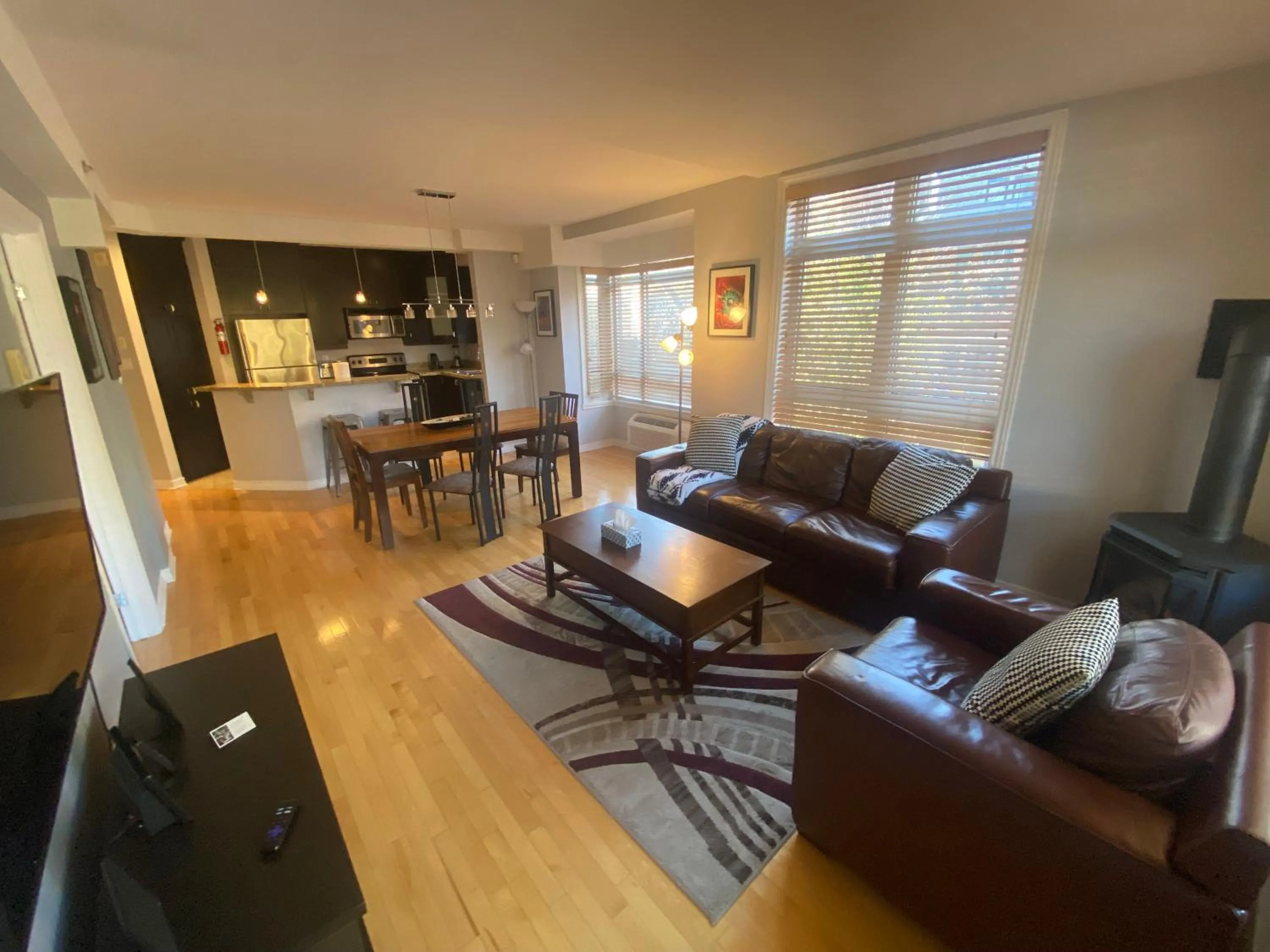 Living room in ApartHotelMontreal by Les Terrasses Saint Urbain 2225I2