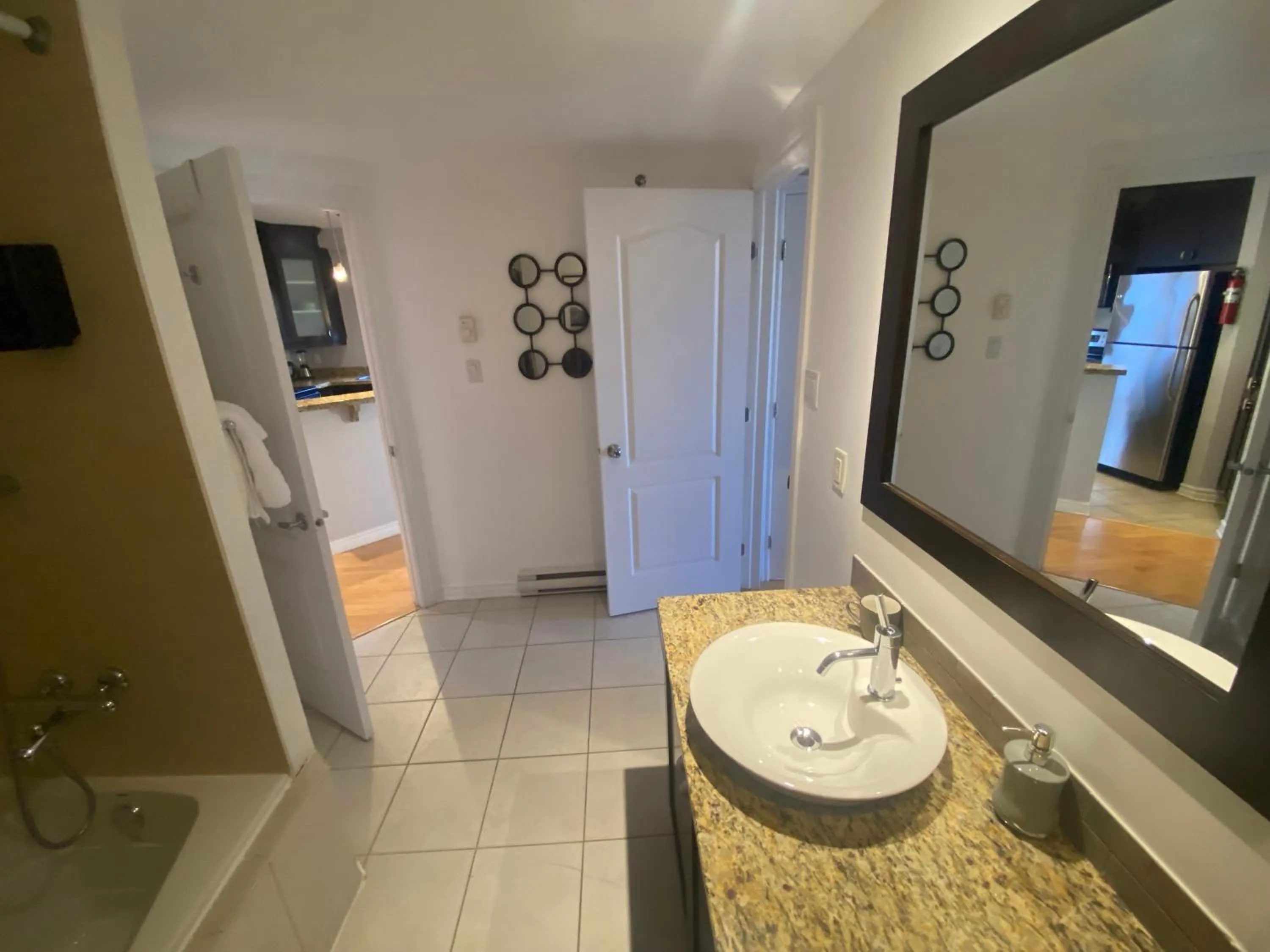 Bathroom in ApartHotelMontreal by Les Terrasses Saint Urbain 2225I2