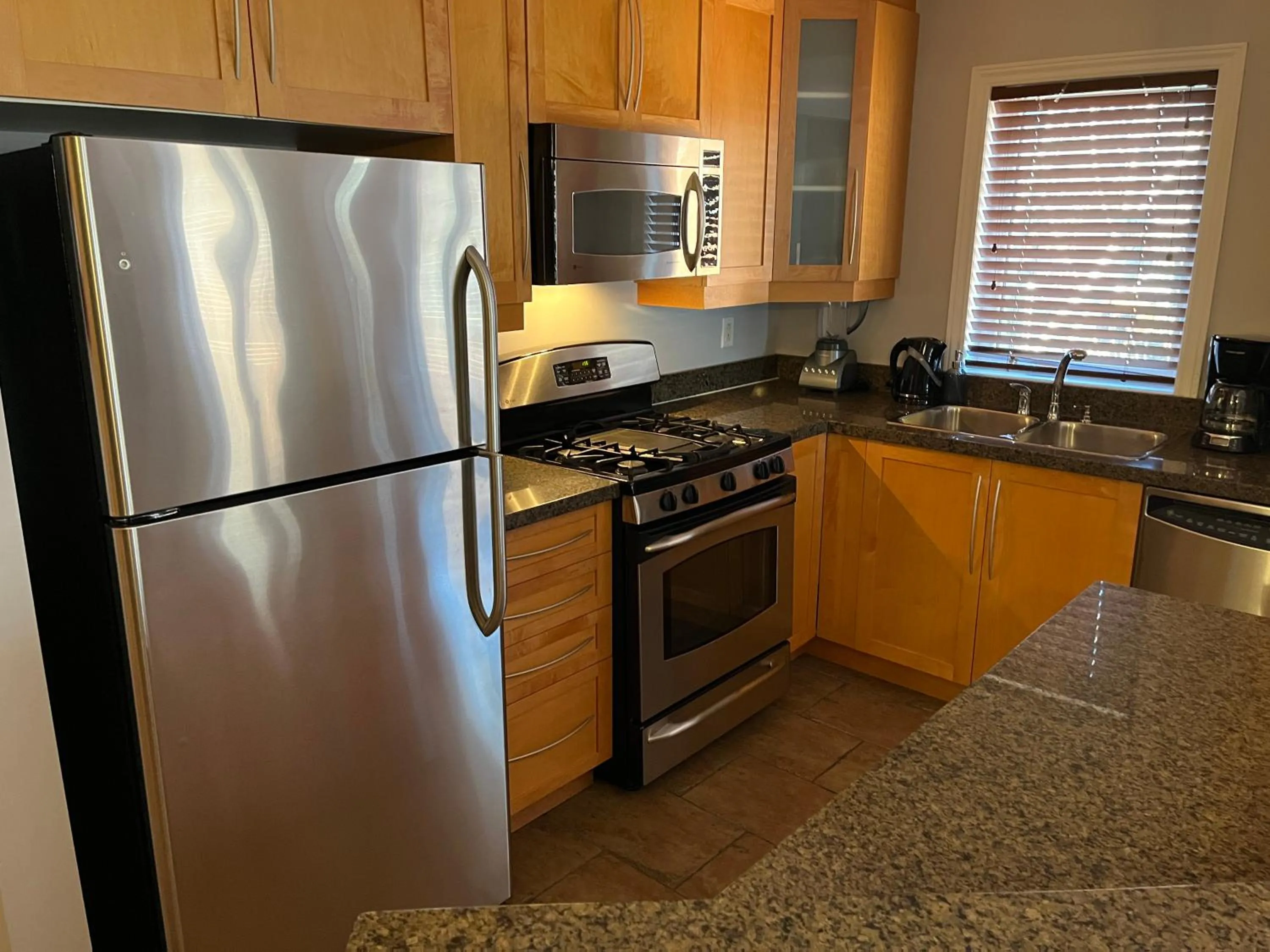 kitchen in ApartHotelMontreal by Les Terrasses Saint Urbain 2225I2