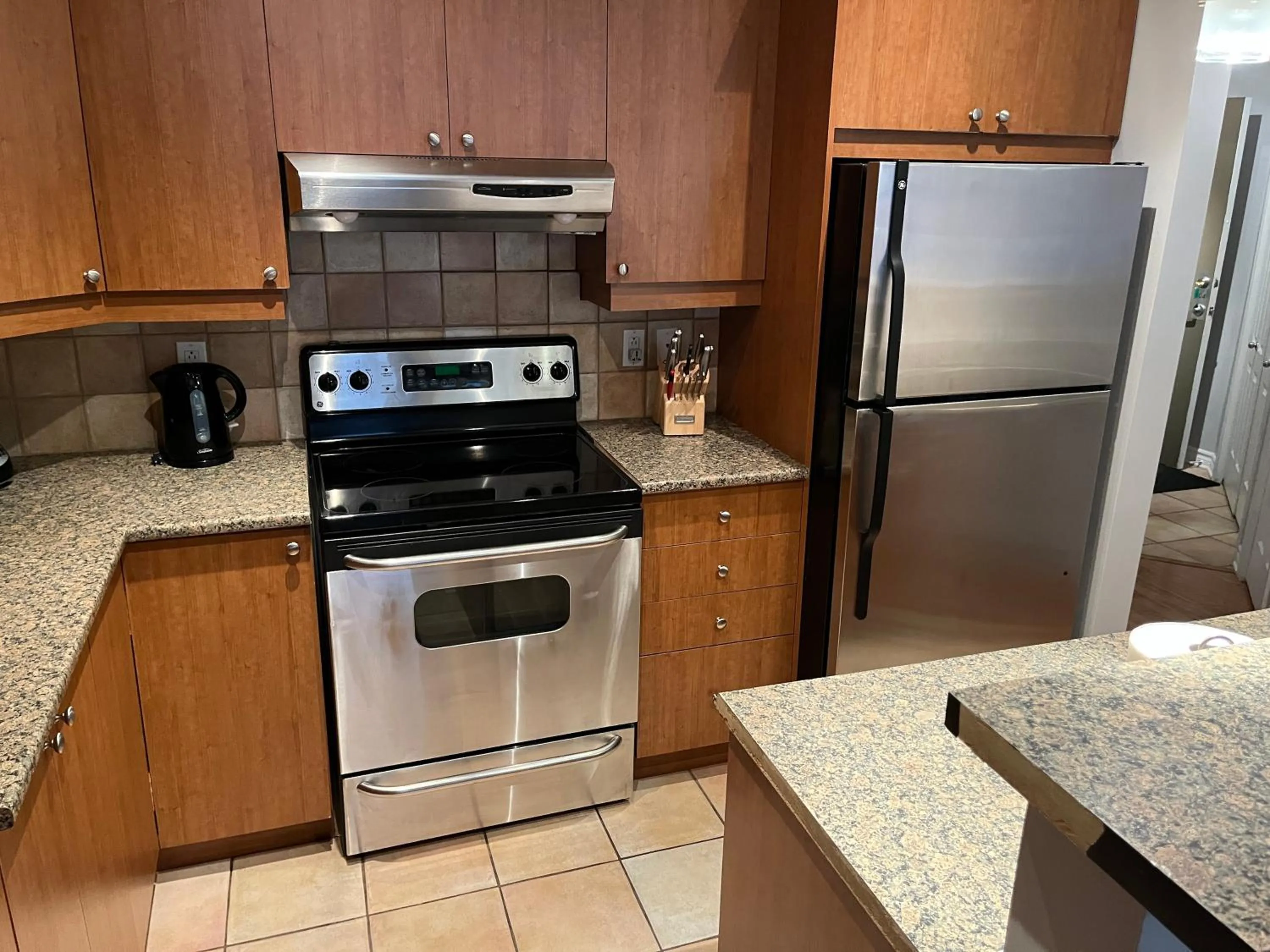 kitchen in ApartHotelMontreal by Les Terrasses Saint Urbain 2225I2