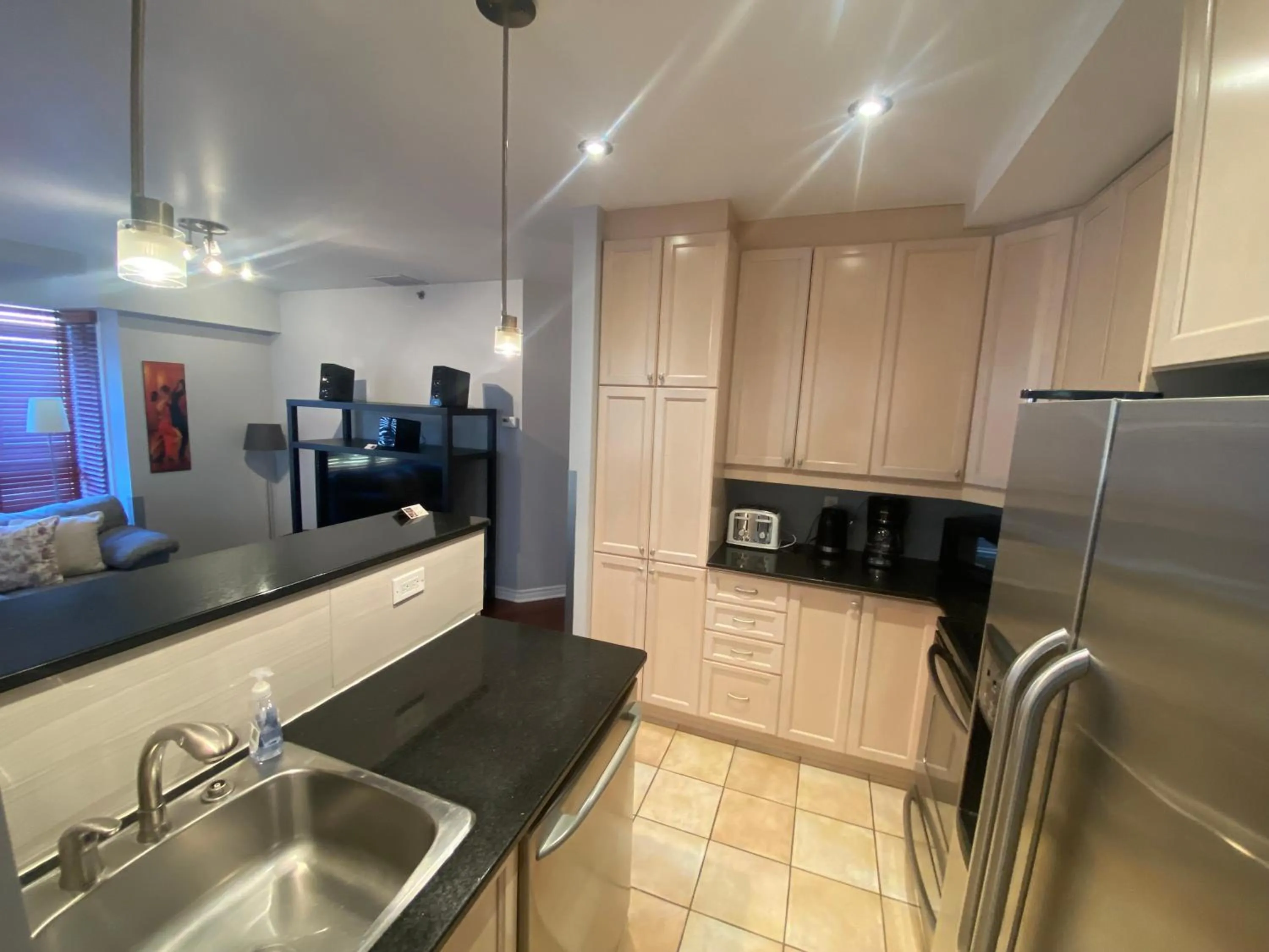 kitchen in ApartHotelMontreal by Les Terrasses Saint Urbain 2225I2