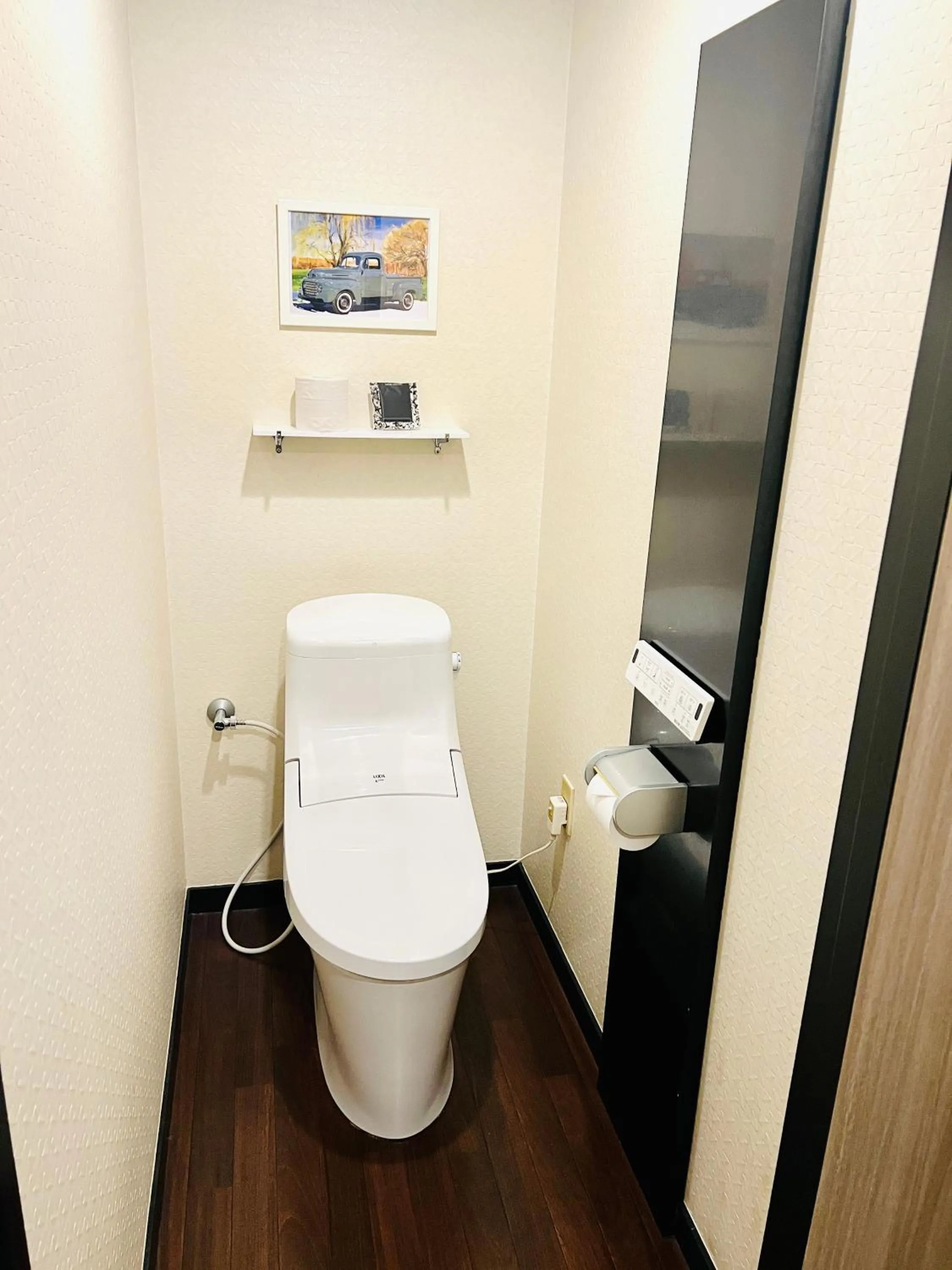 Toilet in ホテル CROWN MOTEL