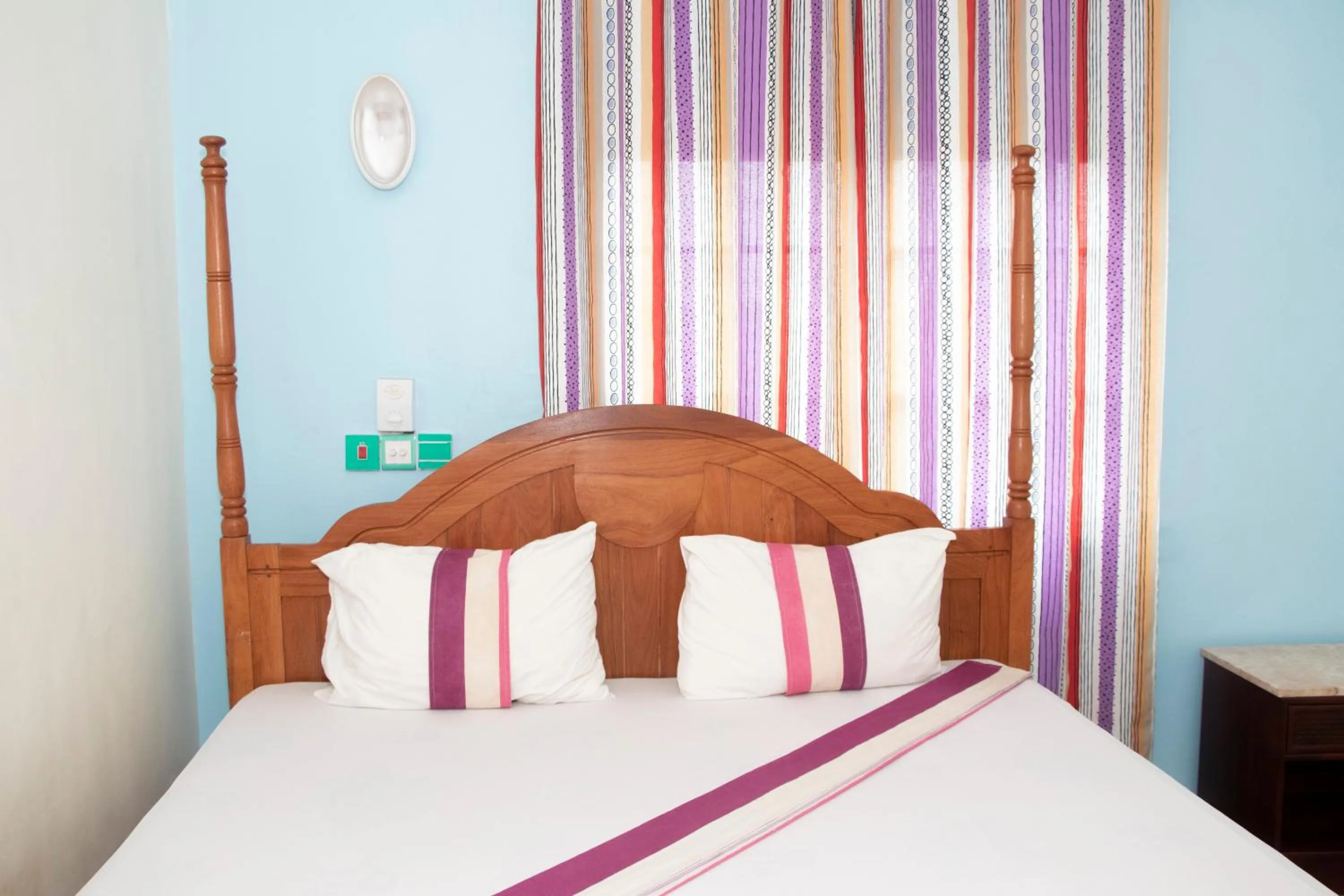 Bed in Alafia Hotel Ketou