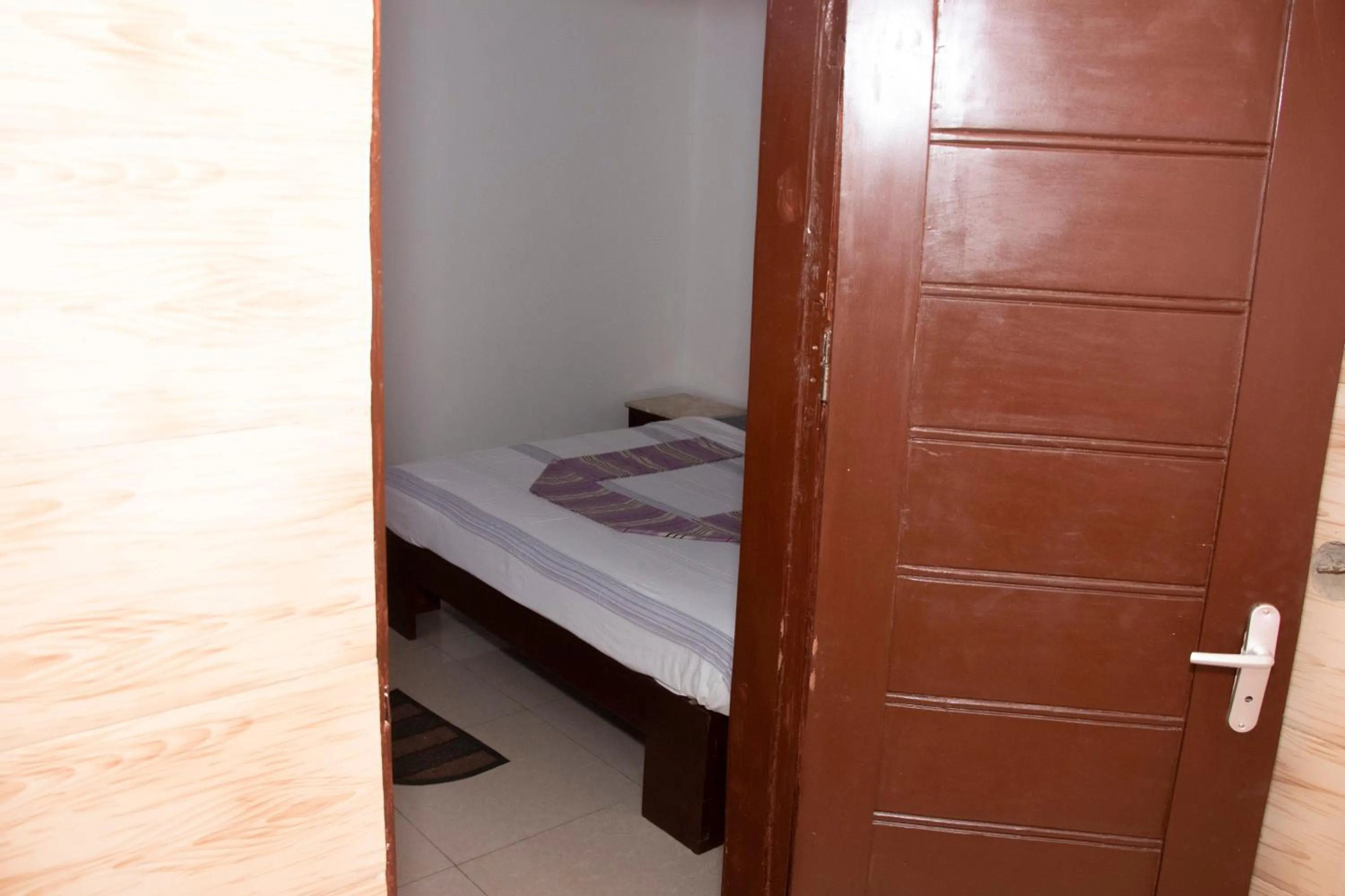 Bed in Alafia Hotel Ketou
