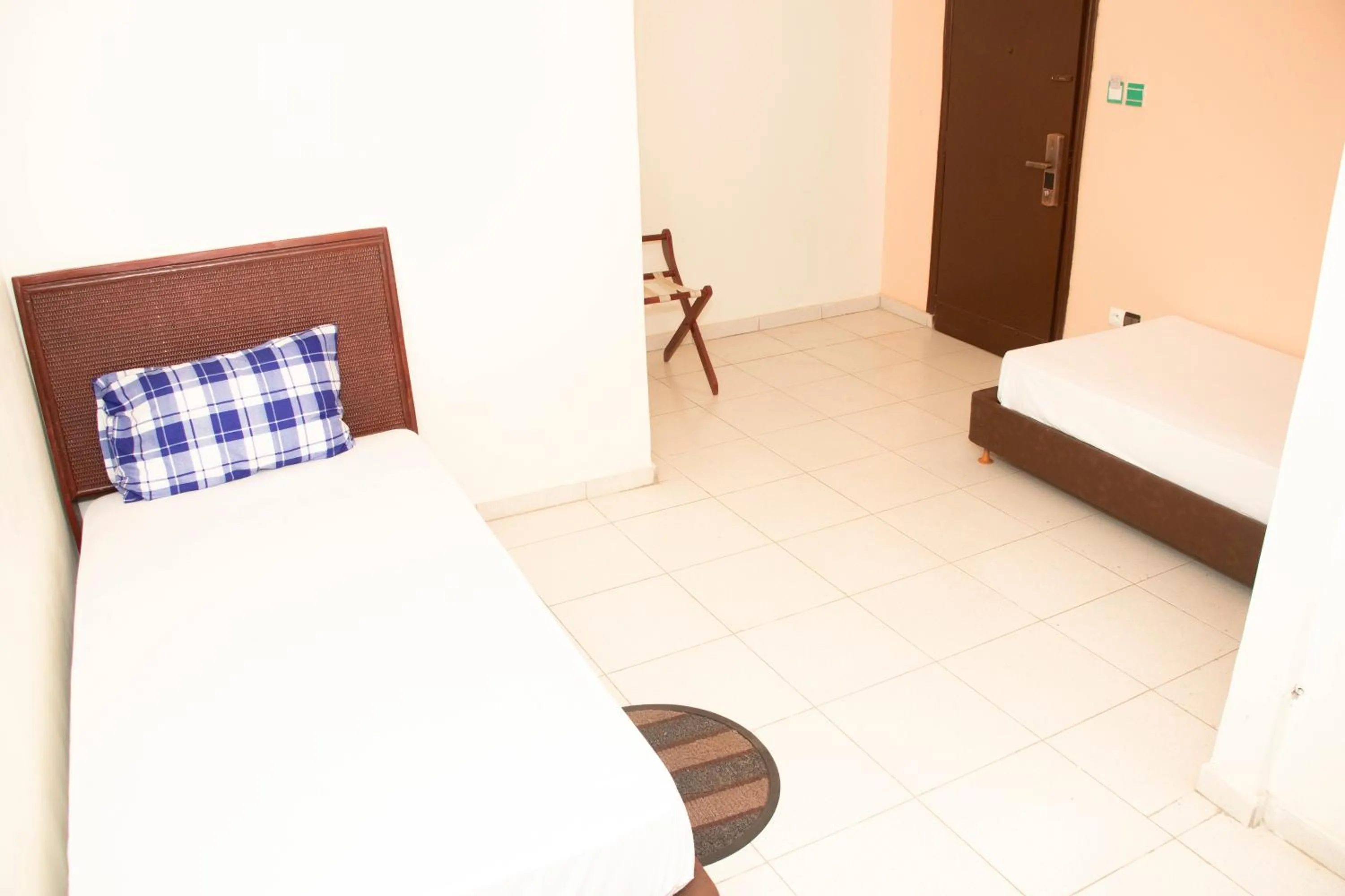 Bed in Alafia Hotel Ketou