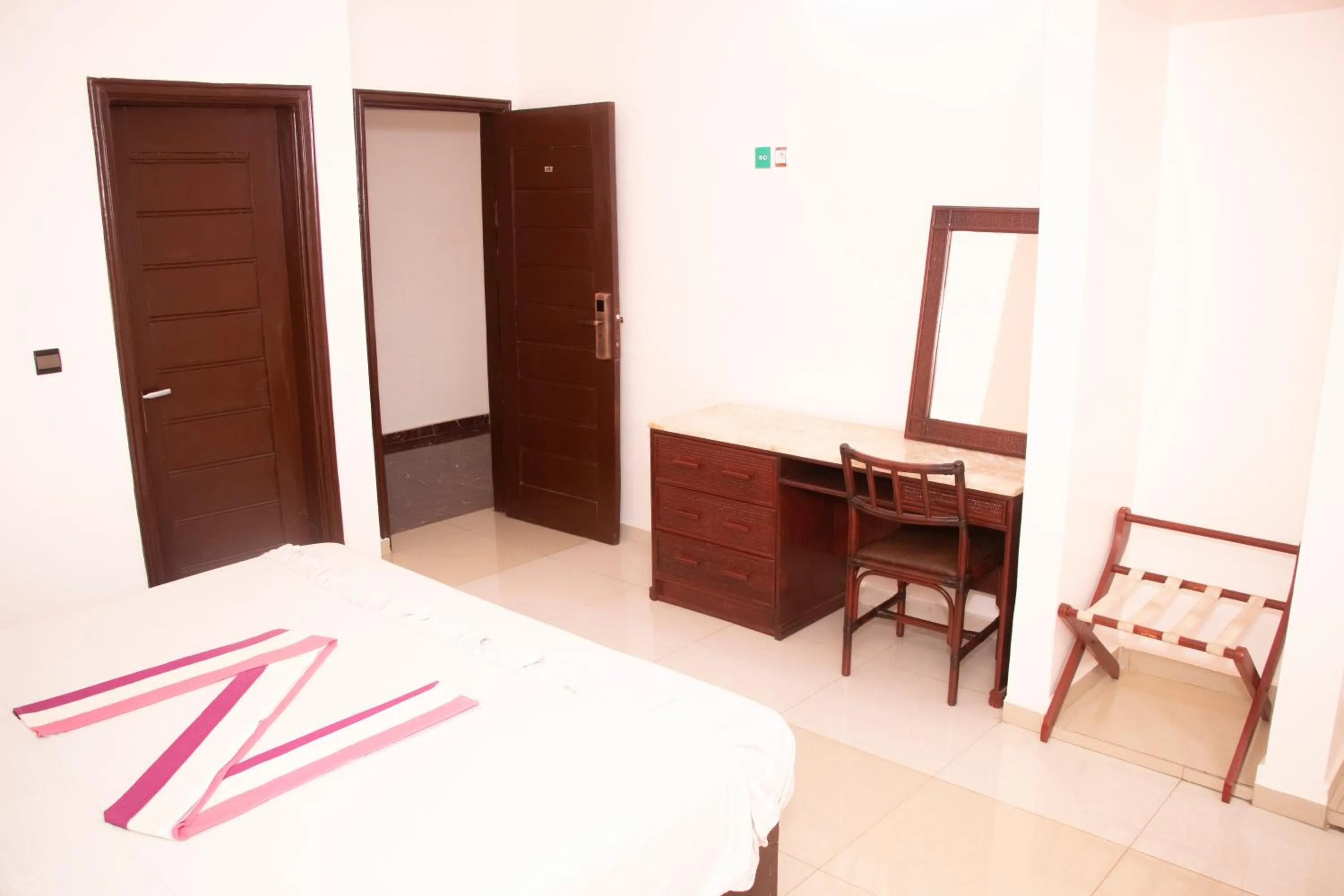 Bed in Alafia Hotel Ketou