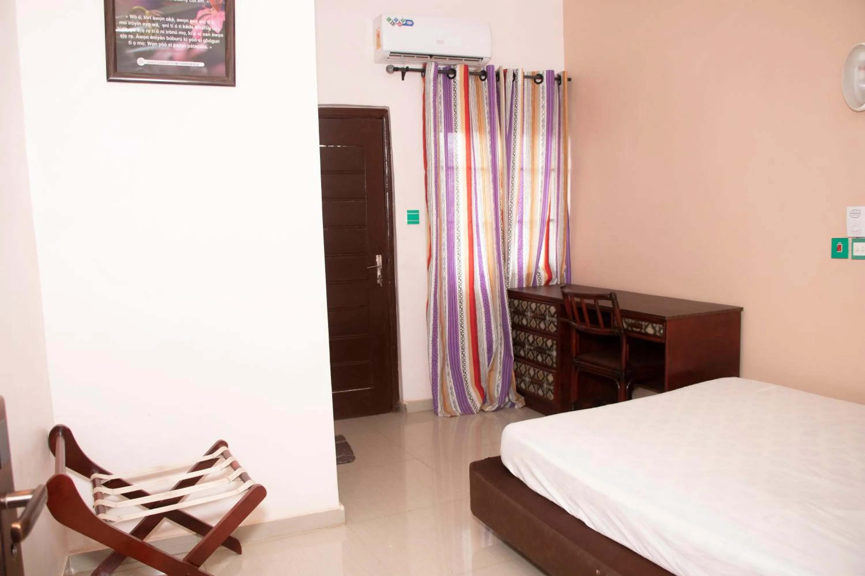 Bed in Alafia Hotel Ketou