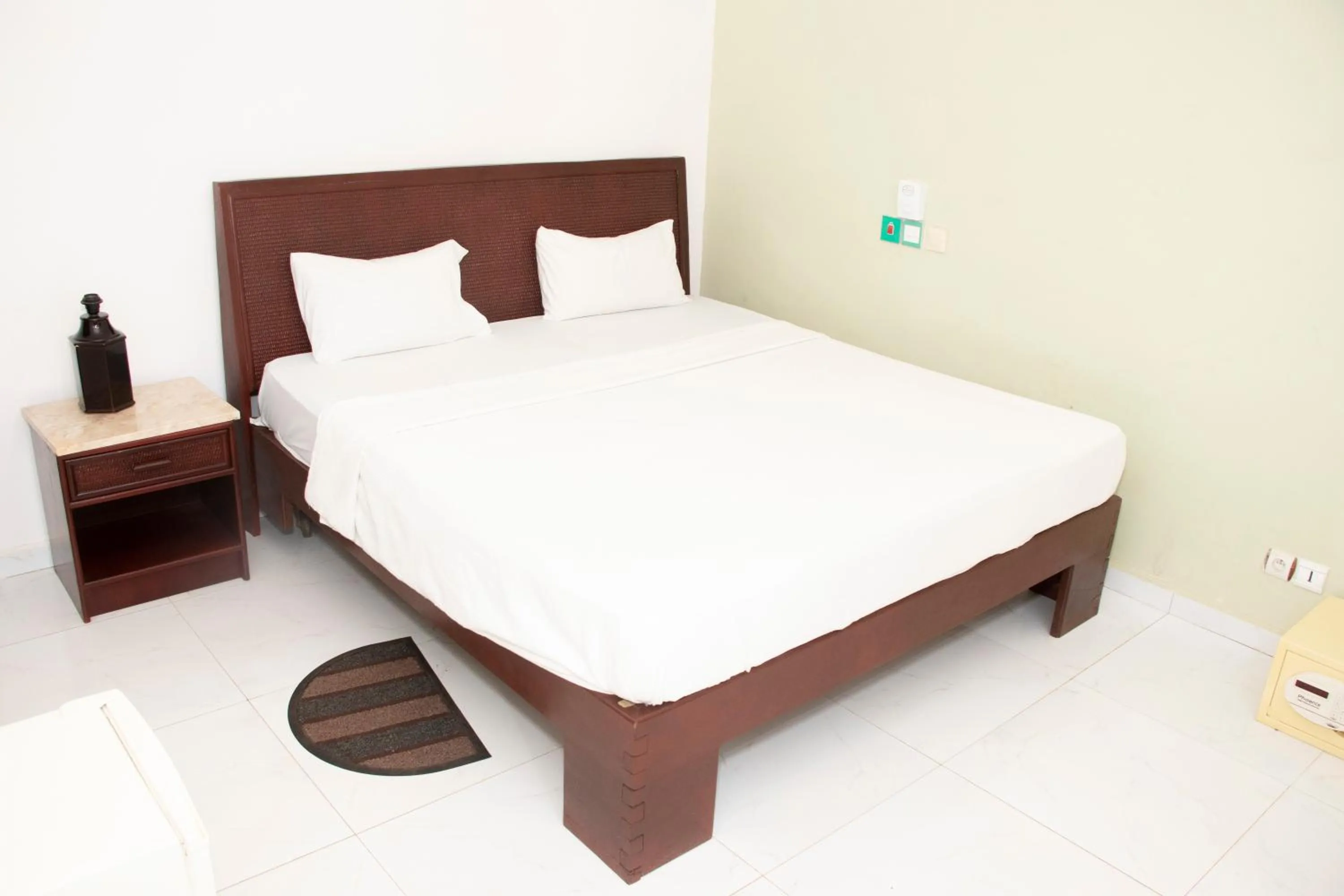 Bed in Alafia Hotel Ketou