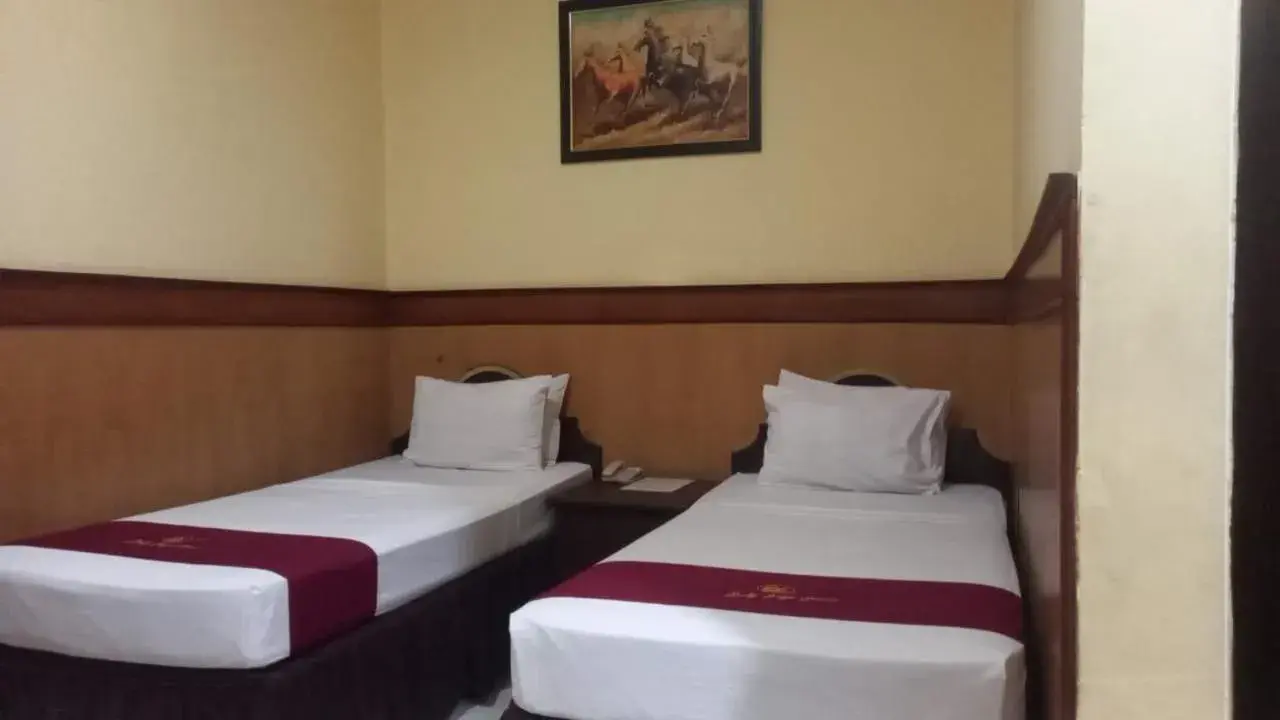 Superior Twin Room in Urbanview Hotel Dedy Jaya Brebes Superior Twin Room in Urbanview Hotel Dedy Jaya Brebes