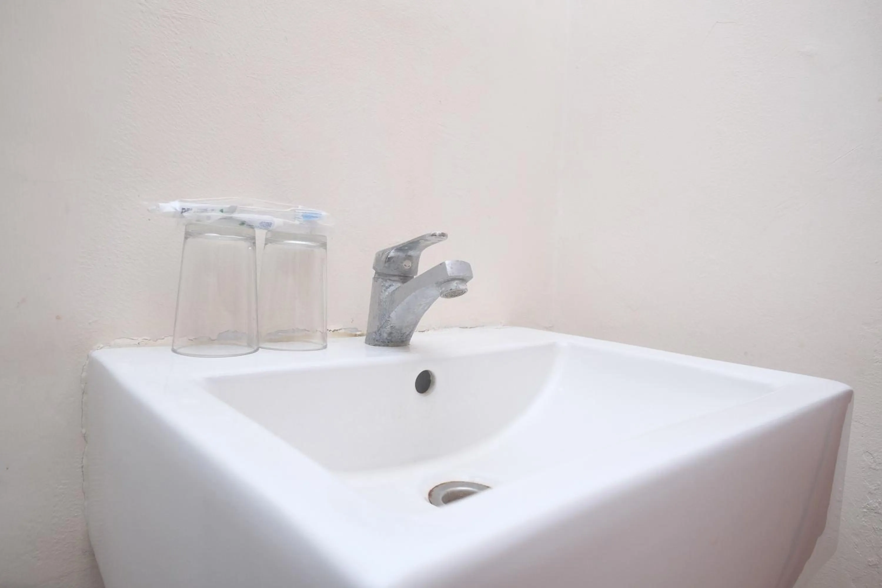 Bathroom in Urbanview Hotel DJ Inn Tegal