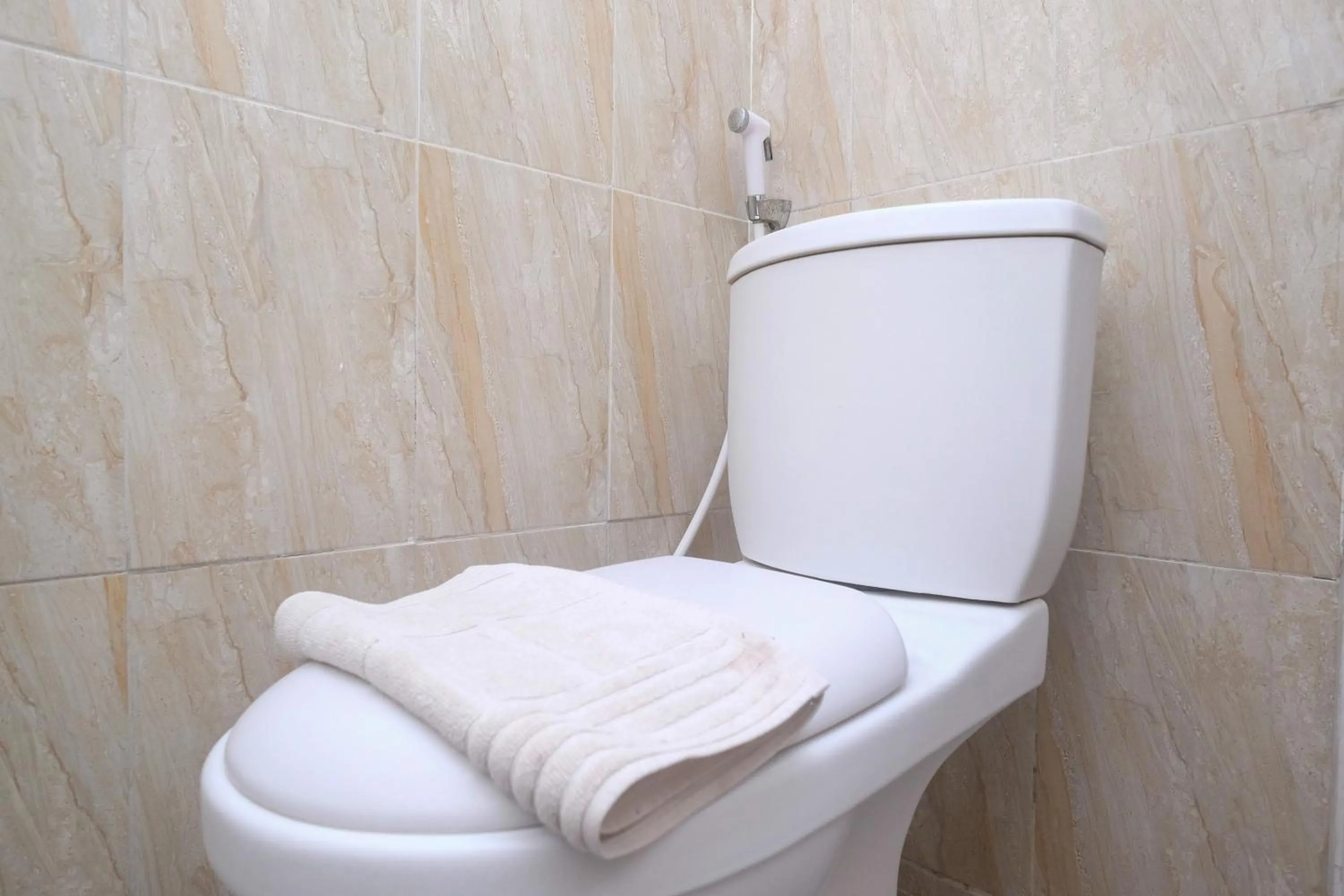 Bathroom in Urbanview Hotel DJ Inn Tegal