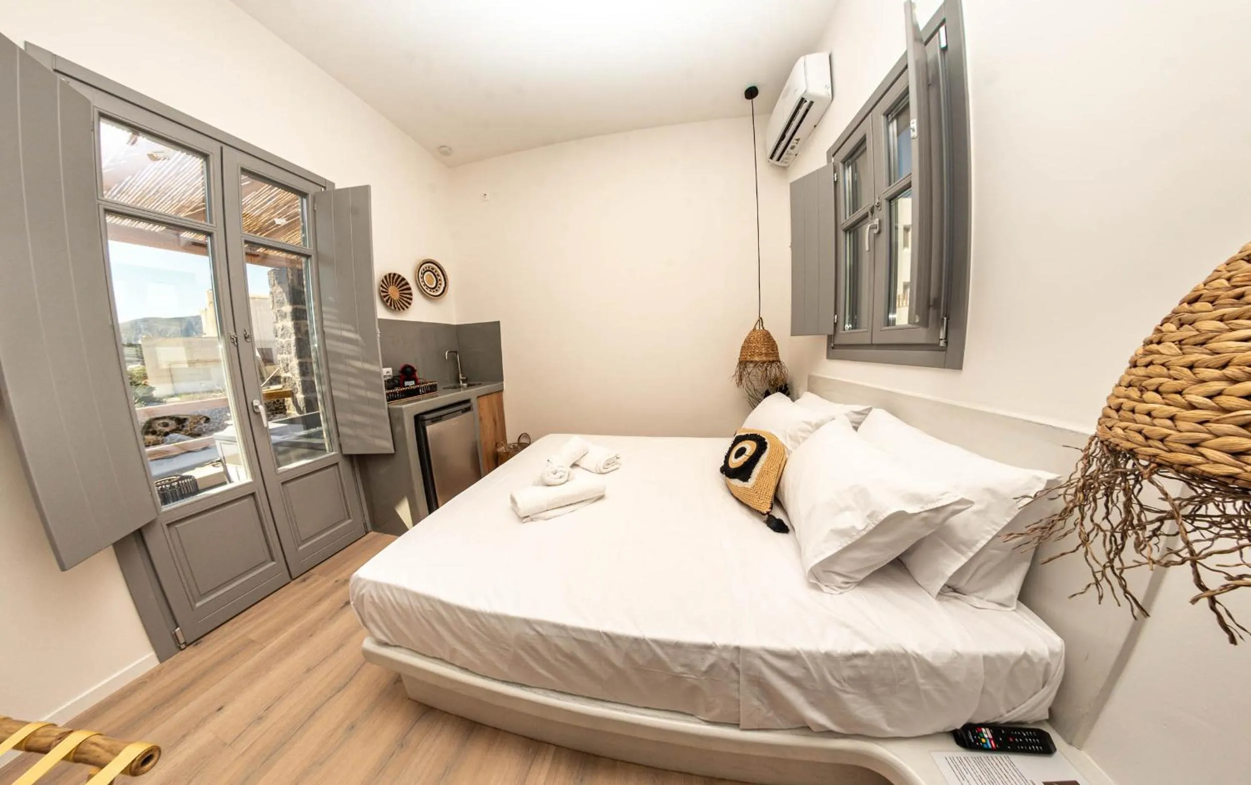 Bed in Aidani Luxurious Rooms