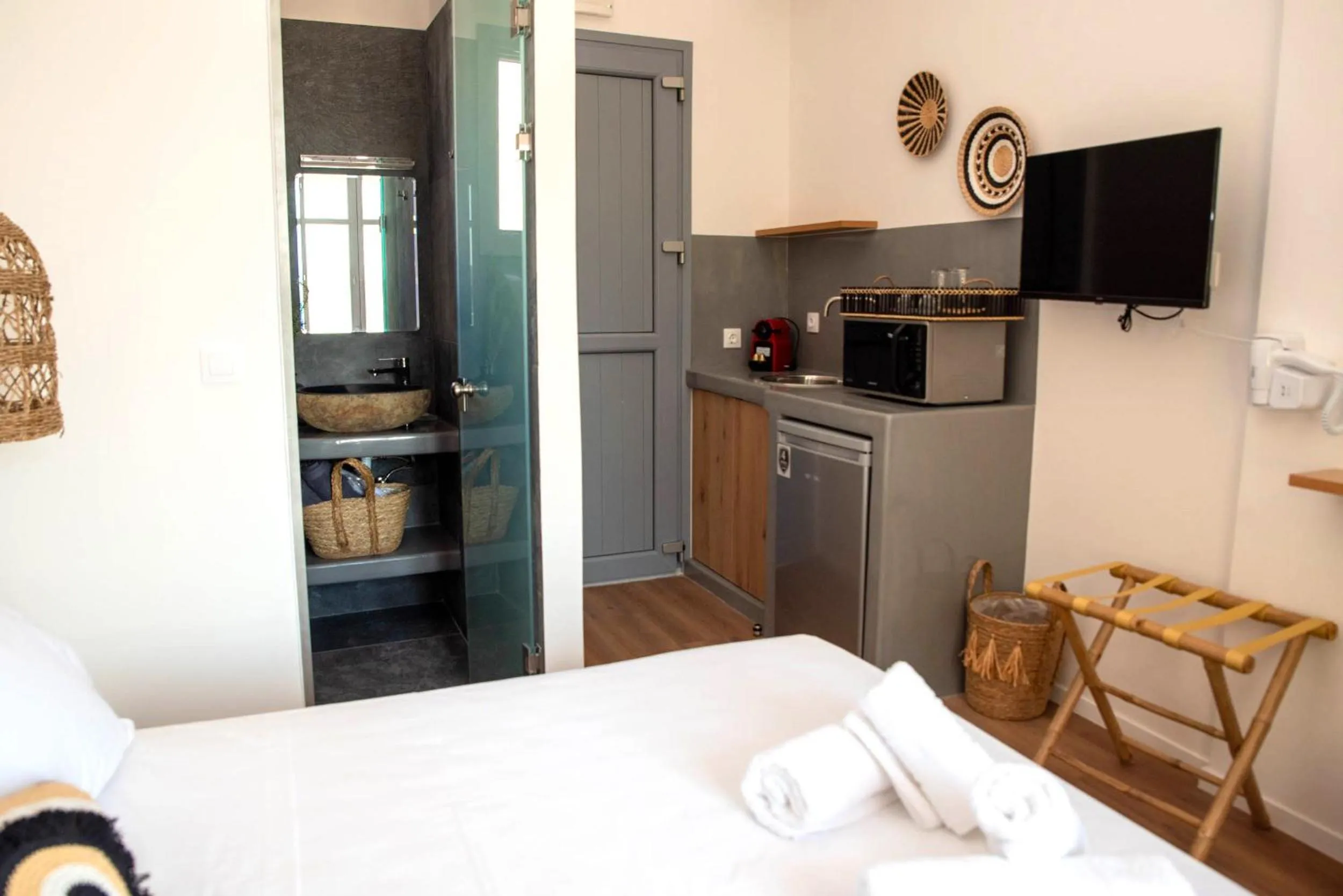 Bed in Aidani Luxurious Rooms