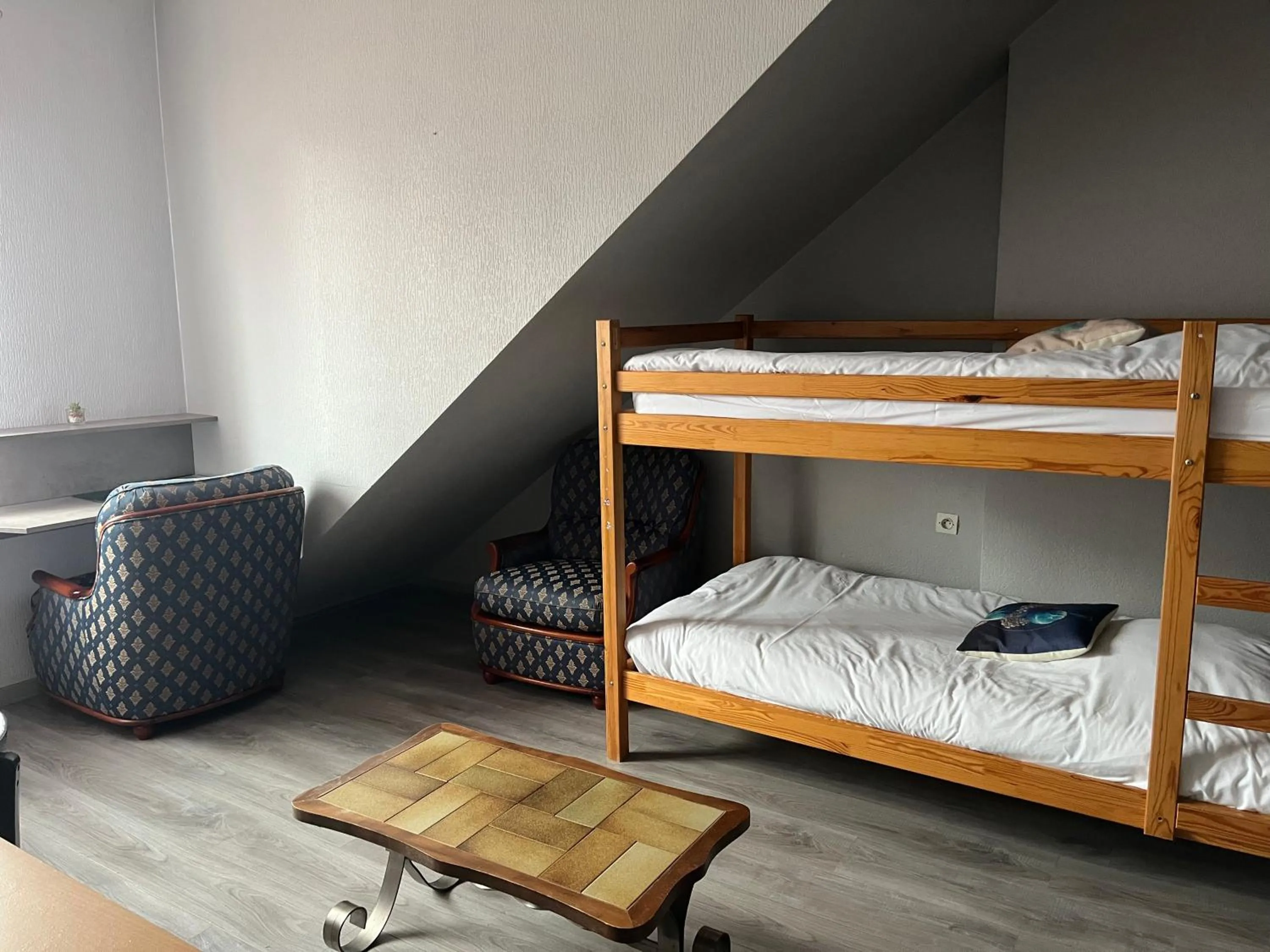 Bed in Logis Hôtel & Restaurant - Le Floride