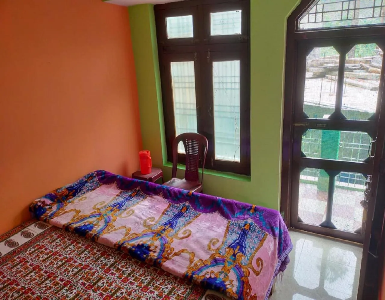 Bed in Mamta Palace by StayApart