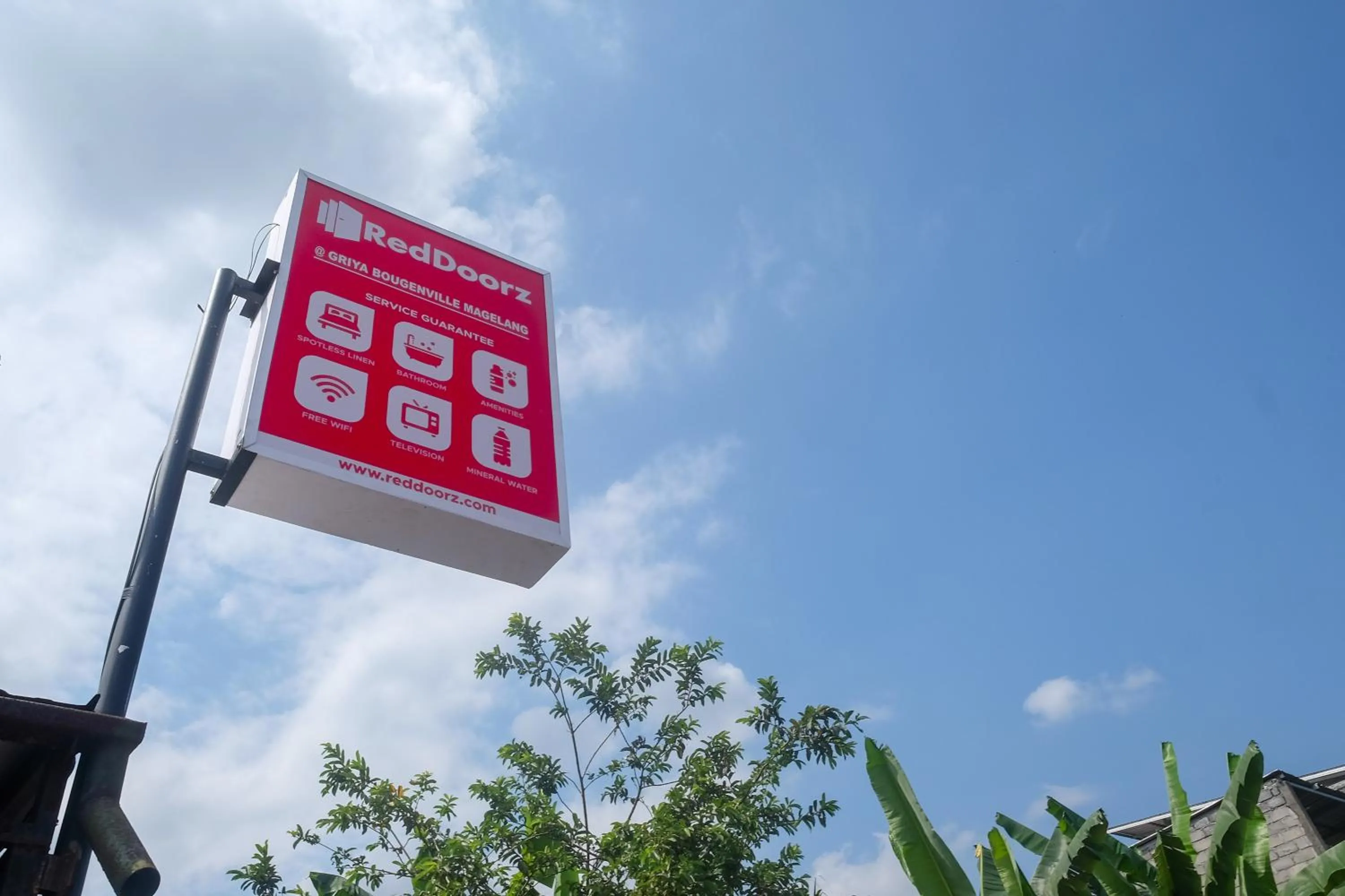Property logo or sign in RedDoorz @ Griya Bougenville Magelang