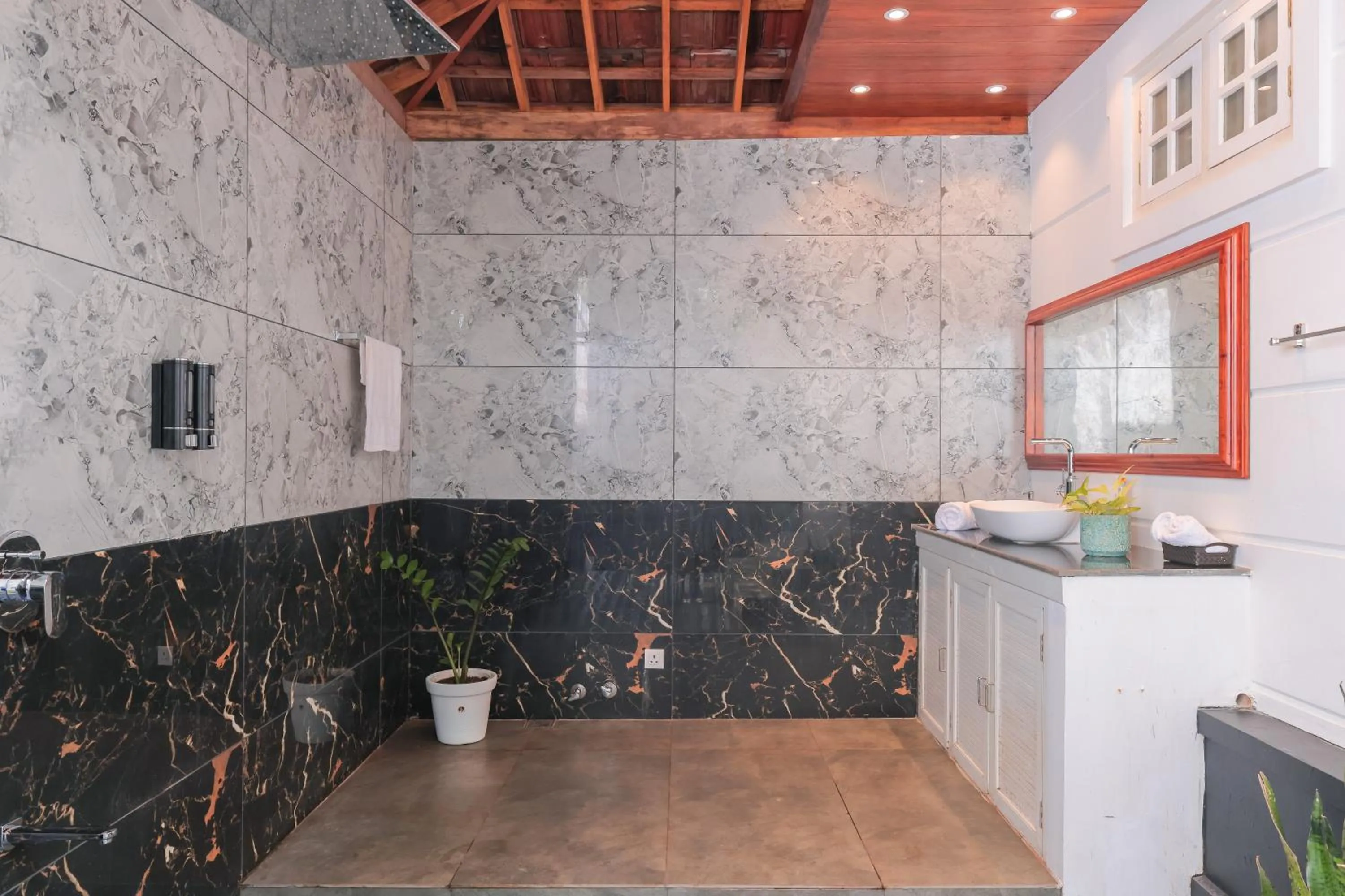 Open Air Bath in Softouch Ayurveda Village Kerala