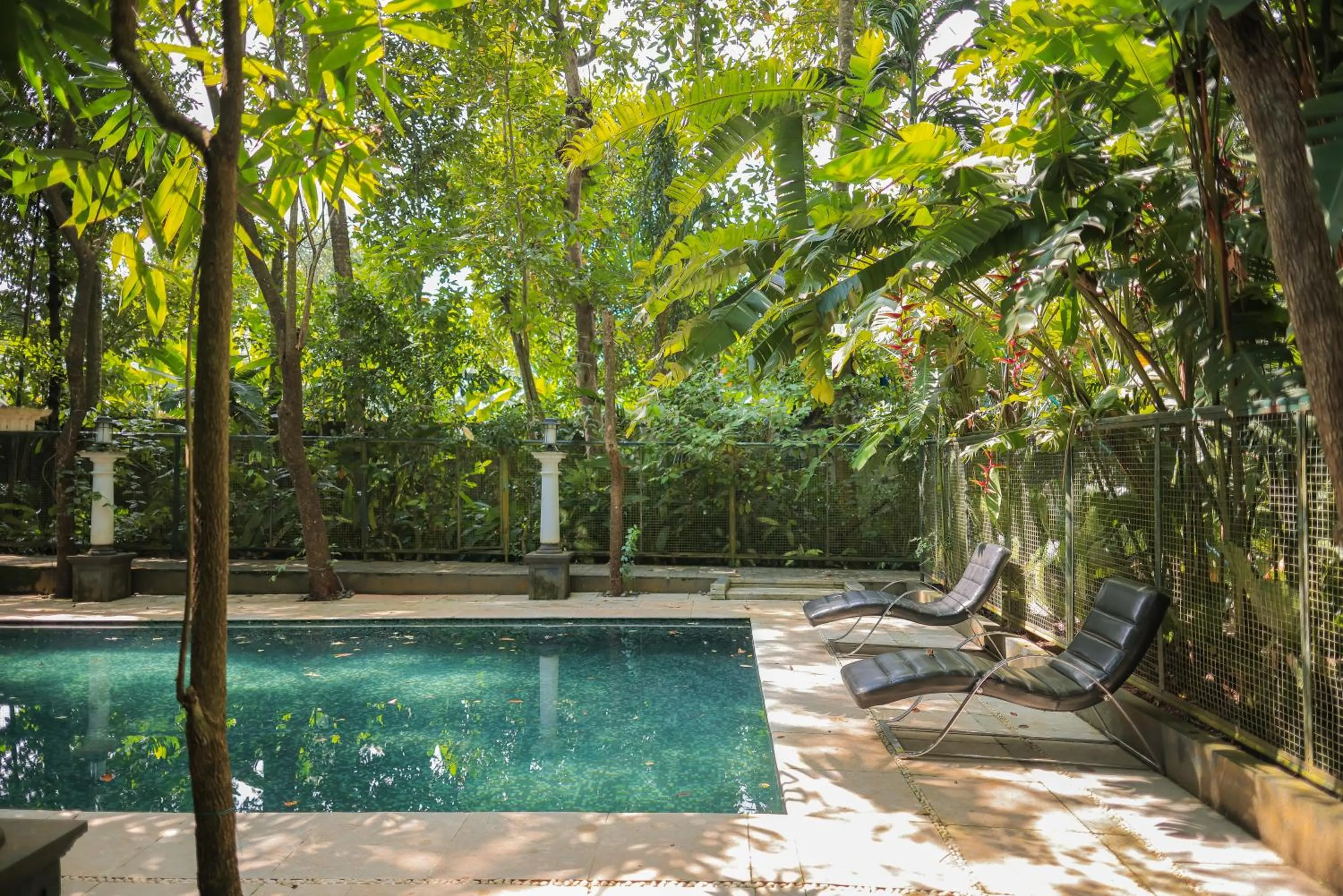 Swimming pool in Softouch Ayurveda Village Kerala