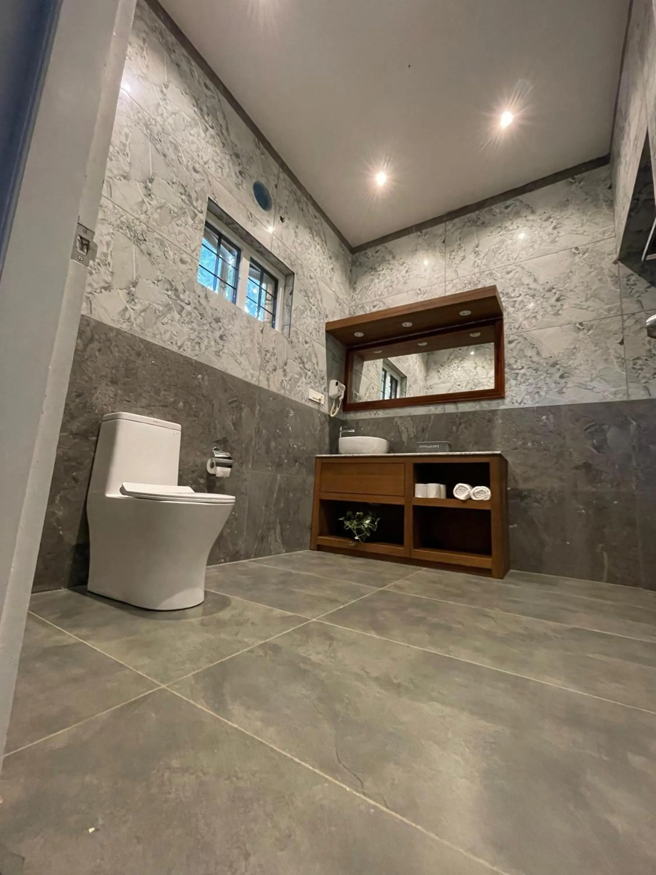 Toilet in Softouch Ayurveda Village Kerala