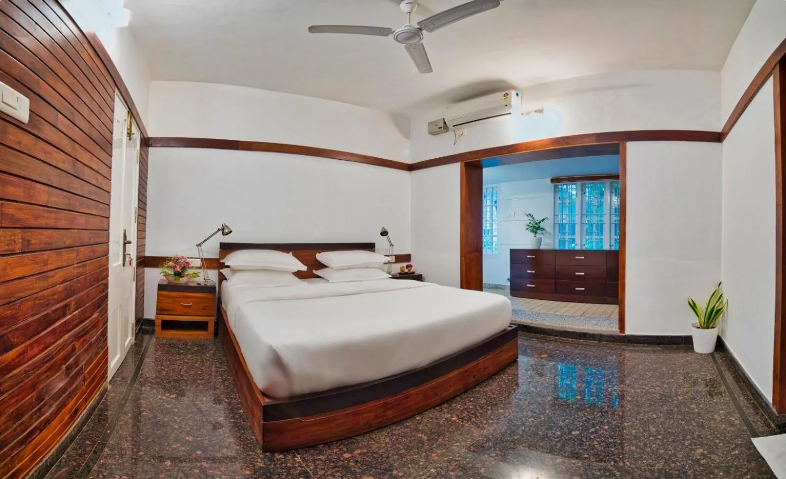 Bed in Softouch Ayurveda Village Kerala