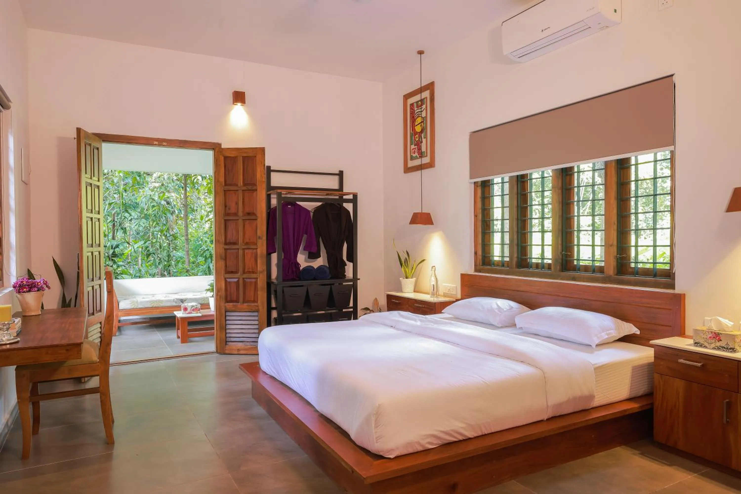 Bedroom in Softouch Ayurveda Village Kerala