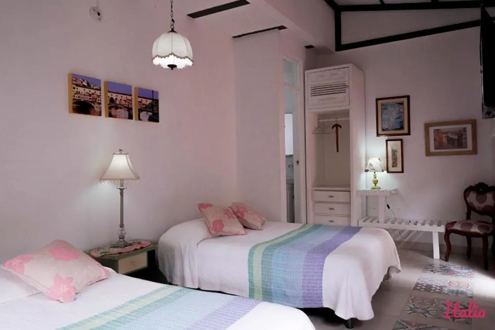 Bed in Posada Las Bromelias