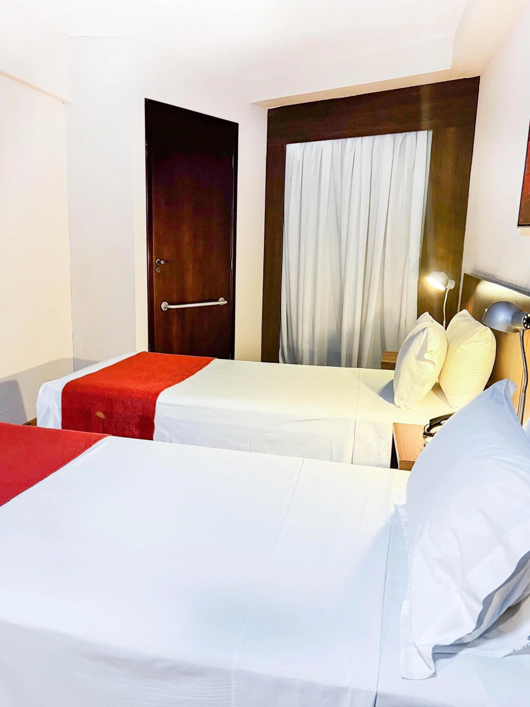 Bed in Royal Design Savassi Hotel