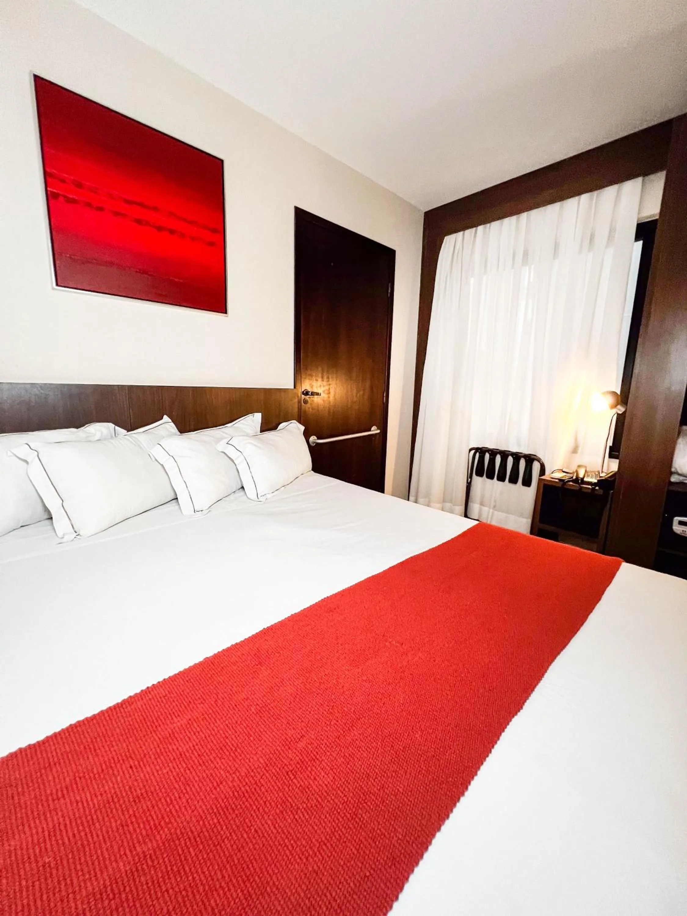 Bed in Royal Design Savassi Hotel